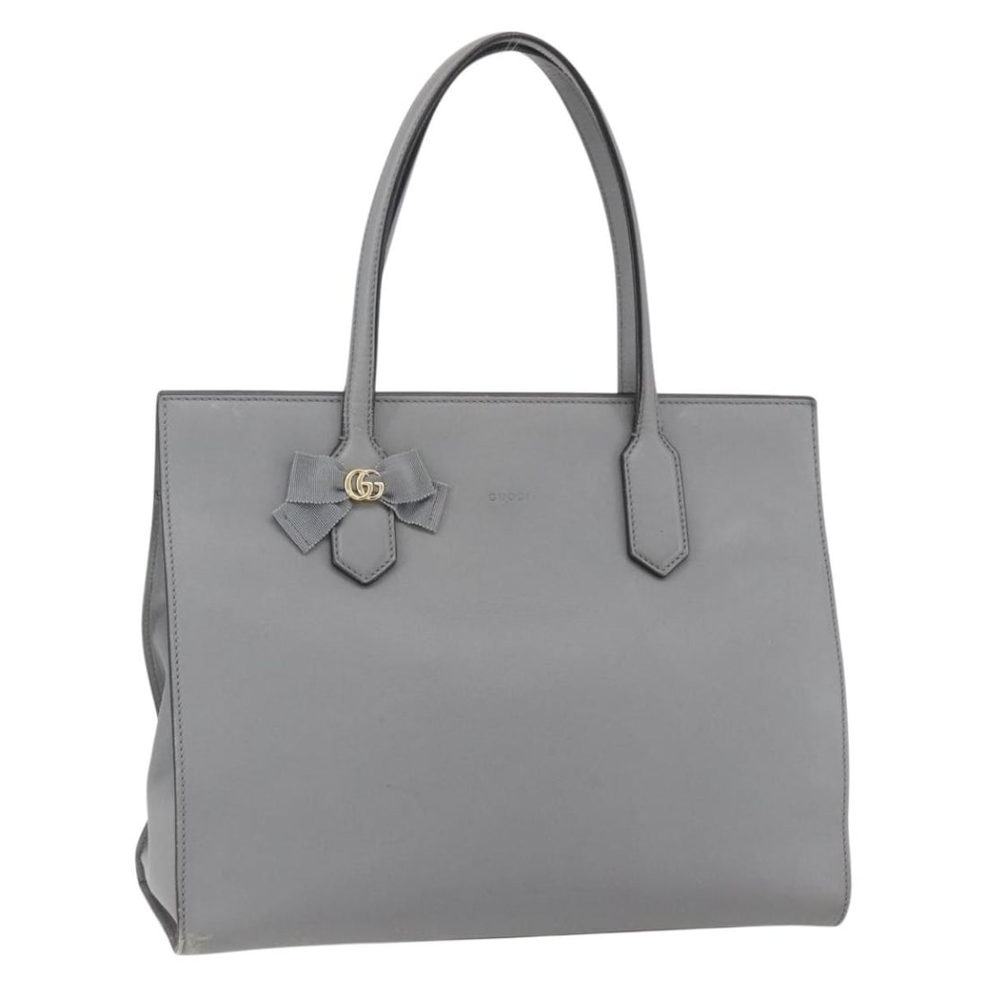 GUCCI 440055 Gray Gold Leather Tote Bag Made in Italy: GUCCI 440055 Gray Gold Leather Tote Bag Made in Italy This authentic GUCCI Tote Bag showcases a sophisticated blend of gray leather with elegant gold accents. Crafted in Italy, it features a spacious 