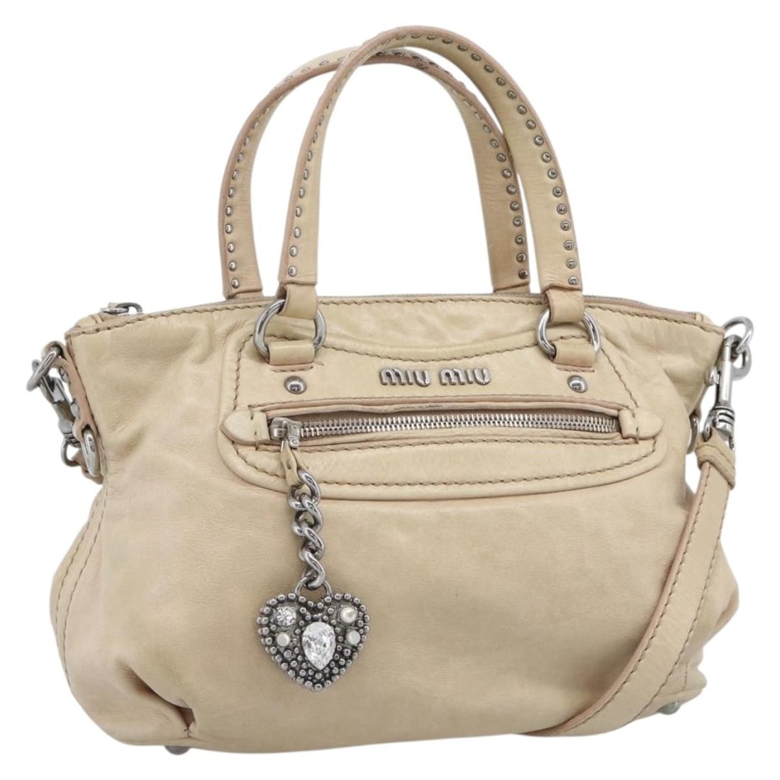 Miu Miu Beige Leather 2way Handbag with Shoulder Strap: Miu Miu Beige Leather 2way Handbag with Shoulder Strap Miu Miu leather 2-way handbag in beige and silver, made in Turkey. It comes with a shoulder strap and features a serial number 194. The bag measu