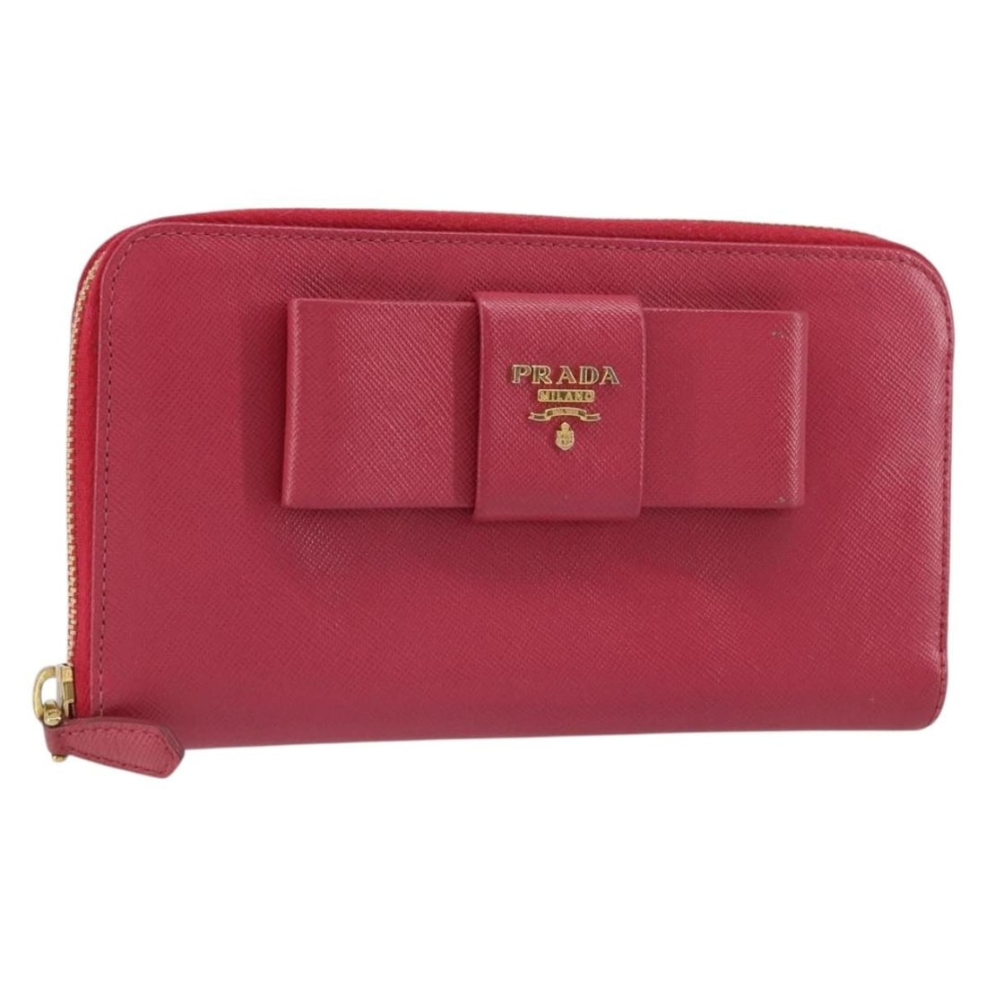 Prada Pink Saffiano Leather Long Ribbon Wallet with Gold Accents: Prada Pink Saffiano Leather Long Ribbon Wallet with Gold Accents This is a PRADA long wallet crafted from Saffiano leather in a pink and gold color combination. The wallet features a ribbon detail and