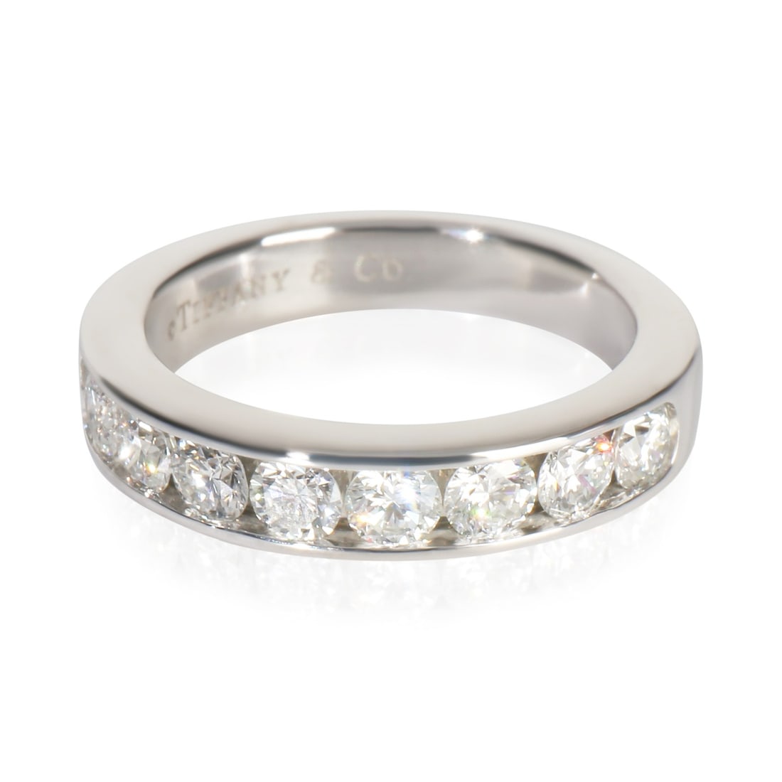 Women's Platinum Band with Diamonds Channel Set by Tiffany & Co. Size 4.5: Women's Platinum Band with Diamonds Channel Set by Tiffany & Co. Size 4.5 This Tiffany & Co. women's channel set band is crafted from 950 platinum and features round brilliant diamonds with a total ca