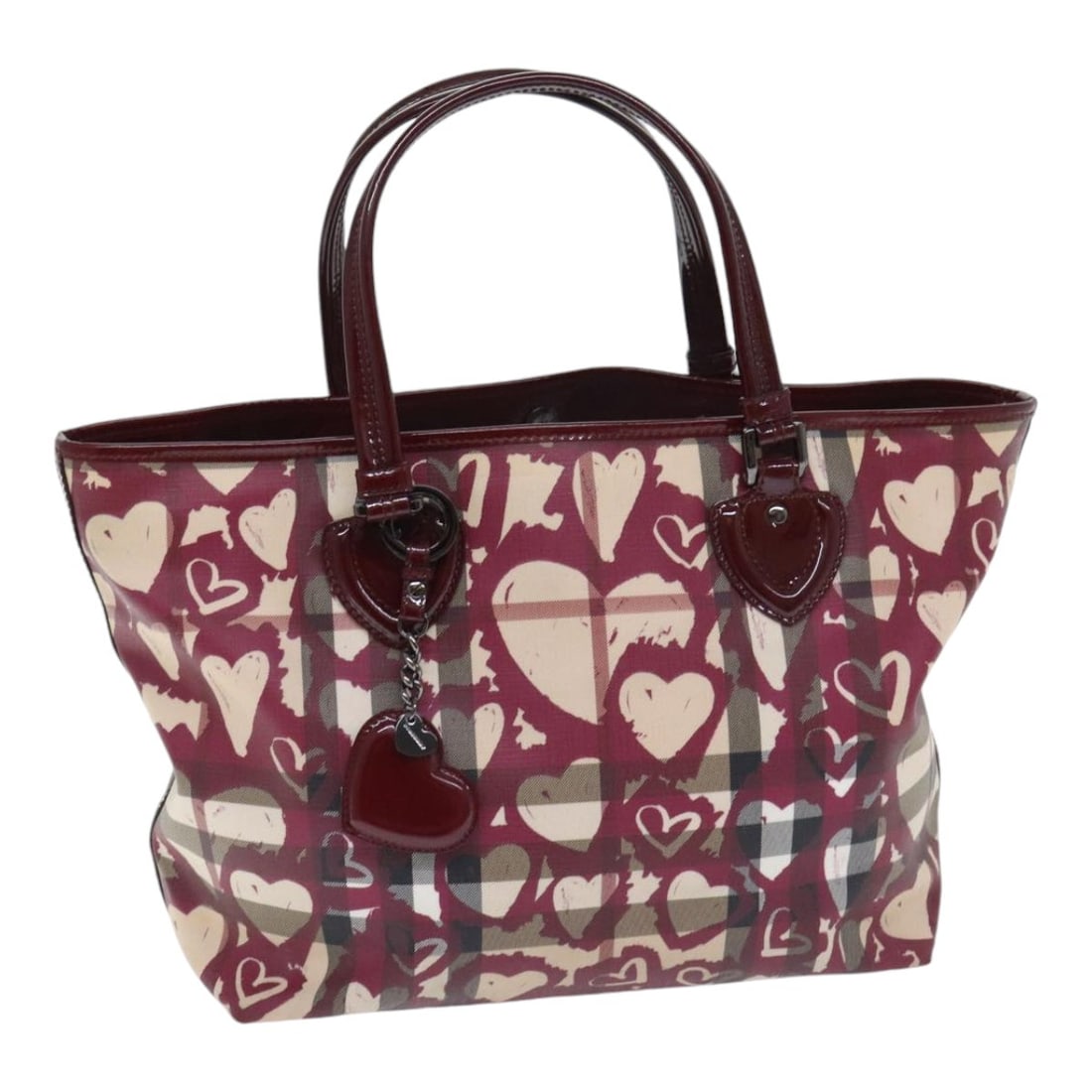 Burberry Nova Check Beige PVC Tote with Silver Accents and Charm: Burberry Nova Check Beige PVC Tote with Silver Accents and Charm This Burberry Nova Check tote bag is crafted from beige and silver PVC leather, featuring the brand's iconic check pattern. Designed fo