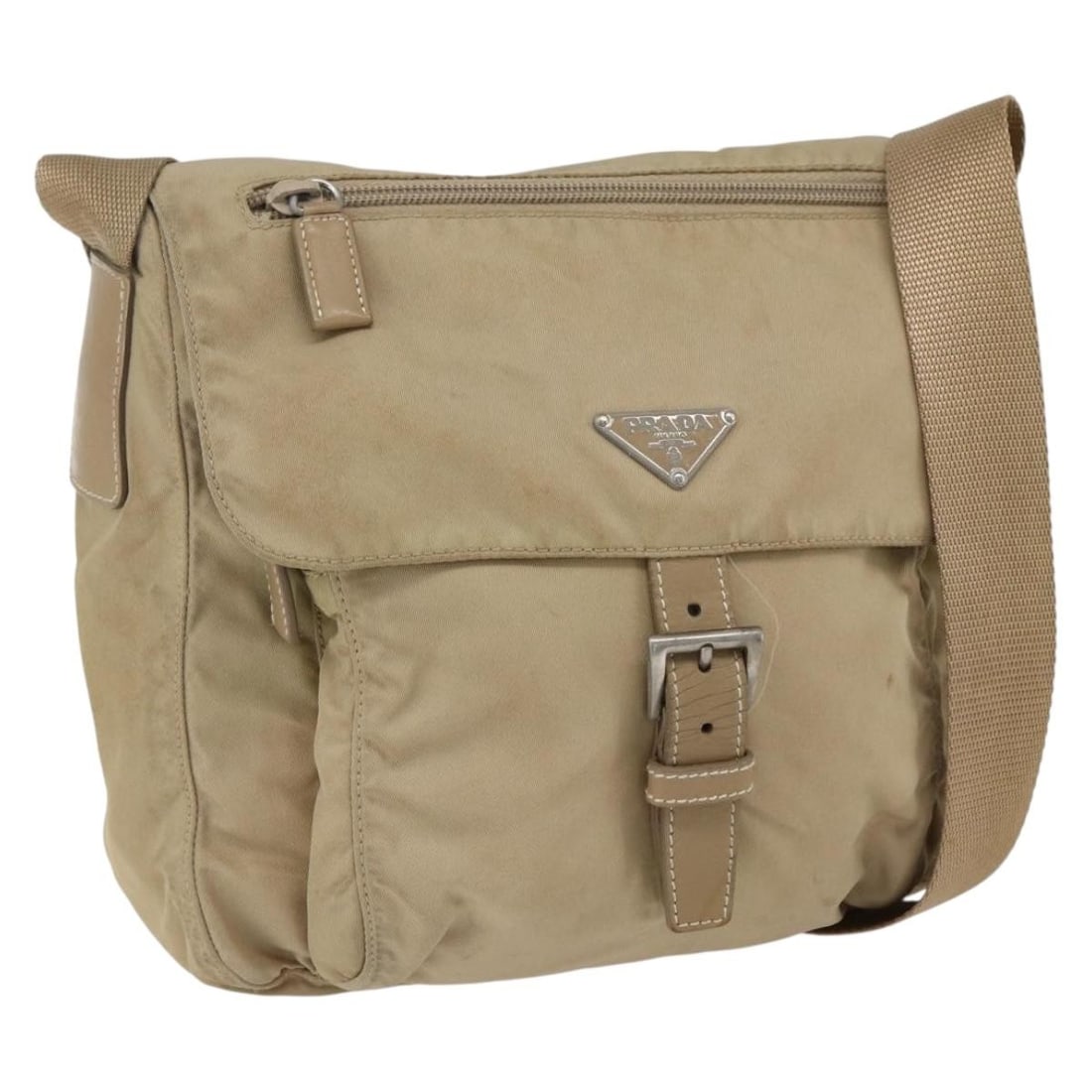 Prada beige nylon women s shoulder bag silver trim Italy: Prada beige nylon women s shoulder bag silver trim Italy This Prada shoulder bag is crafted from beige and silver nylon, offering a stylish and practical accessory for everyday use. Made in Italy, the