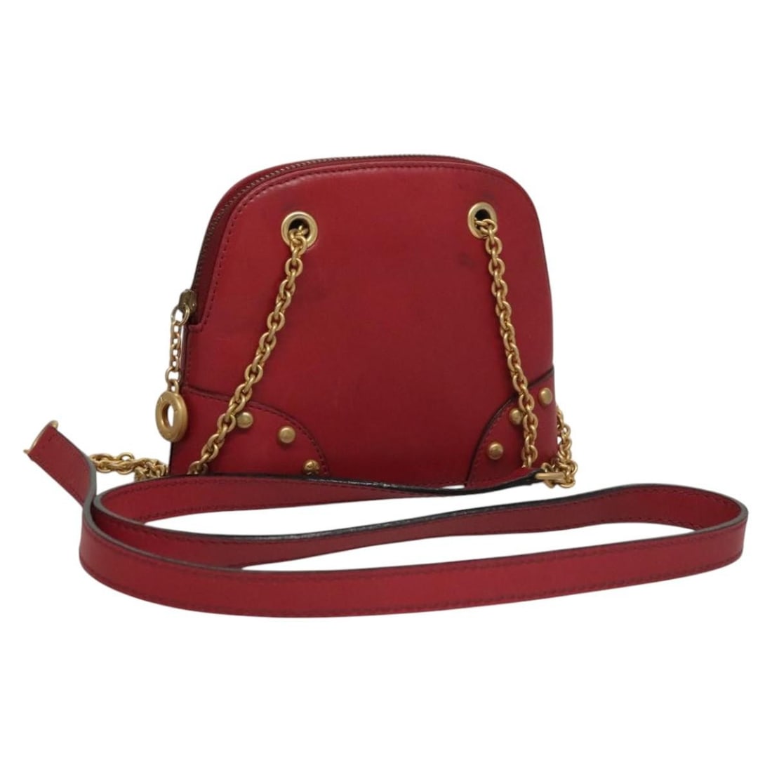 Red Leather Chain Shoulder Bag by CELINE with Gold Accents: Red Leather Chain Shoulder Bag by CELINE with Gold Accents This CELINE shoulder bag features a red leather exterior accented with gold-tone elements, designed for women. The bag offers a compact struc