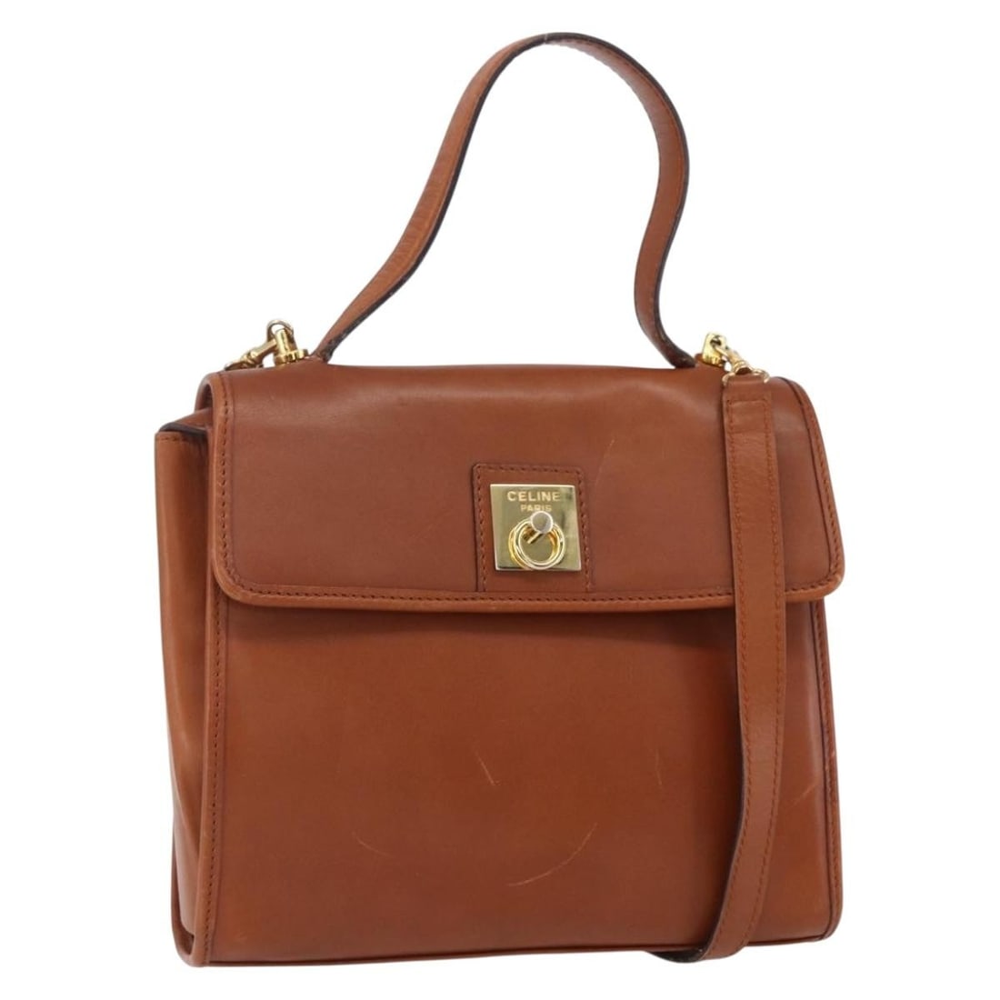 CELINE Brown Leather 2way Handbag with Shoulder Strap: CELINE Brown Leather 2way Handbag with Shoulder Strap Celine 2-way handbag in brown leather with gold-tone accents. Made in Italy, this women's bag includes a shoulder strap for hand or shoulder carry