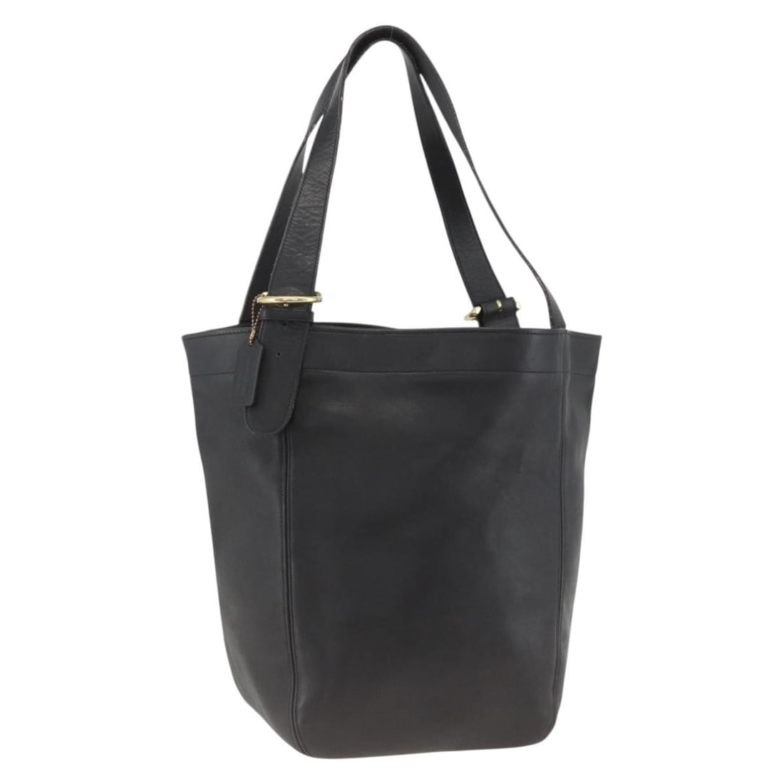 Black Leather Tote with Gold Accents by Coach USA: Black Leather Tote with Gold Accents by Coach USA This is a Coach tote bag crafted from black leather with gold-tone accents. Designed for women, the bag features a spacious interior and a comfortable