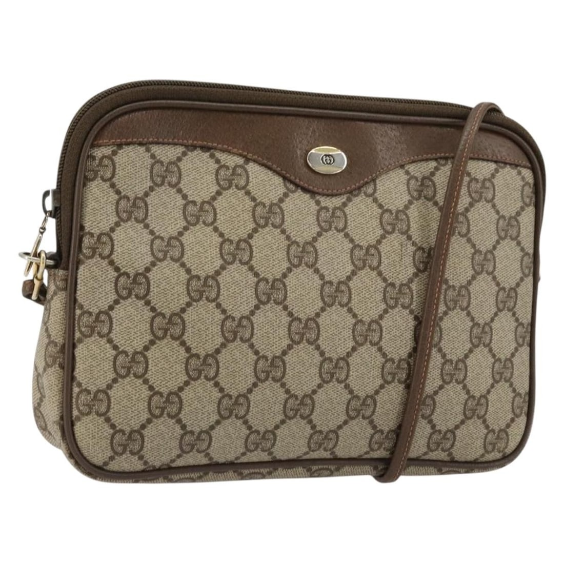 Gucci Beige Gold PVC Leather Shoulder Bag 89 02 068: Gucci Beige Gold PVC Leather Shoulder Bag 89 02 068 This GUCCI GG Supreme shoulder bag features a beige and gold color scheme and is constructed from PVC leather and GG canvas. Made in Italy, the bag 