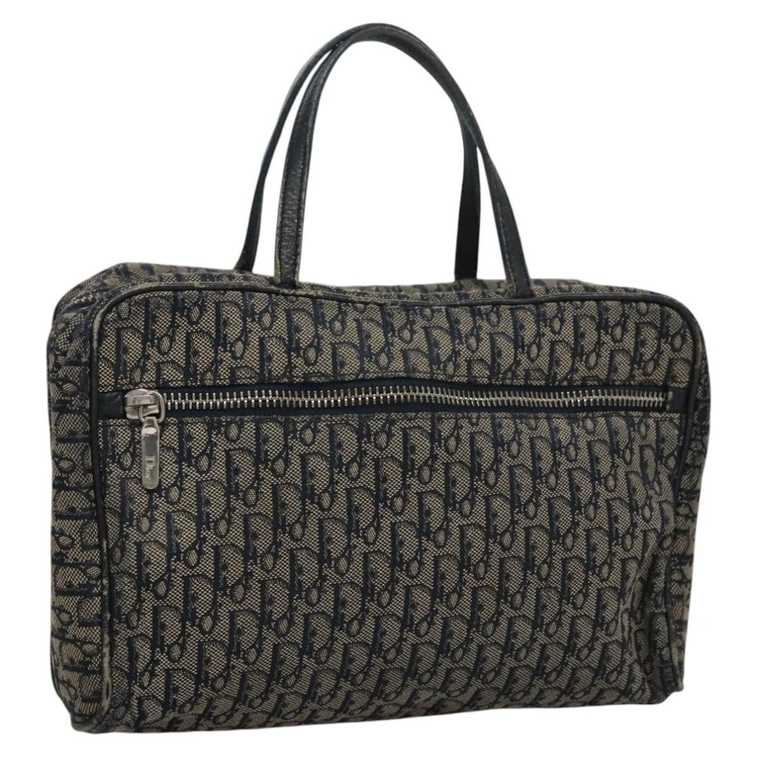Christian Dior Navy Trotter Canvas Women's Handbag Made in Spain: Christian Dior Navy Trotter Canvas Women's Handbag Made in Spain This Christian Dior Trotter Canvas Hand Bag features a navy exterior and is crafted from signature Trotter canvas. Designed for women, 