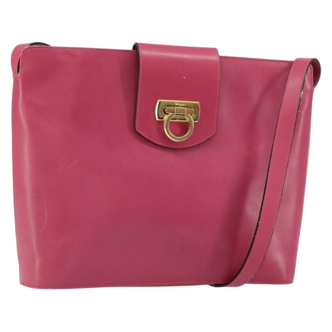 Salvatore Ferragamo Pink Gold Leather Gancini Shoulder Bag Italy: Salvatore Ferragamo Pink Gold Leather Gancini Shoulder Bag Italy This Salvatore Ferragamo Gancini shoulder bag features a pink and gold leather exterior with gold-tone hardware. The bag is designed fo
