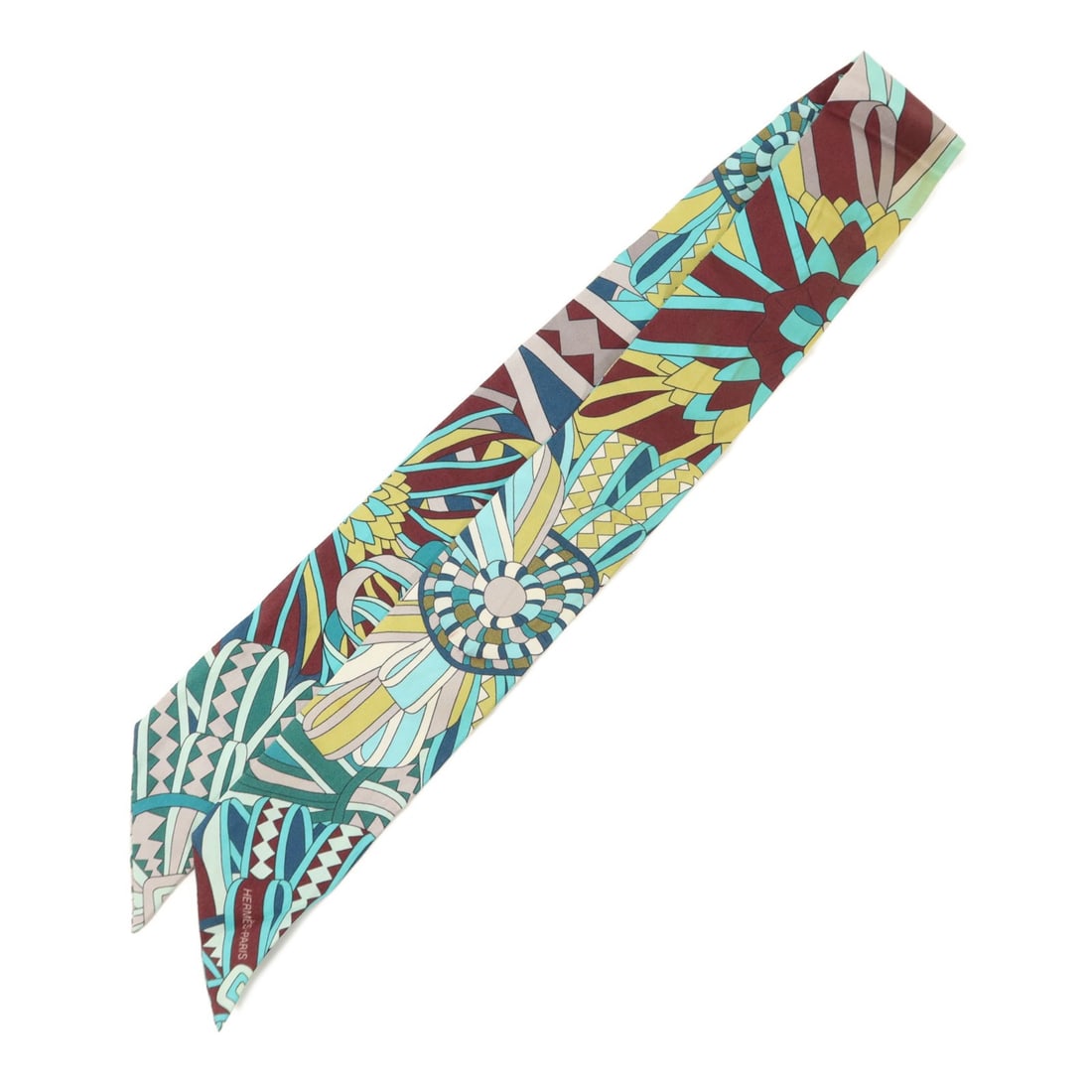 Green Silk Twilly Scarf by Hermes for Women: Green Silk Twilly Scarf by Hermes for Women A HERMES Twilly scarf in green silk, designed for women. Made in France, this regular-size scarf measures 86 cm x 5 cm and is listed in heavily used conditi