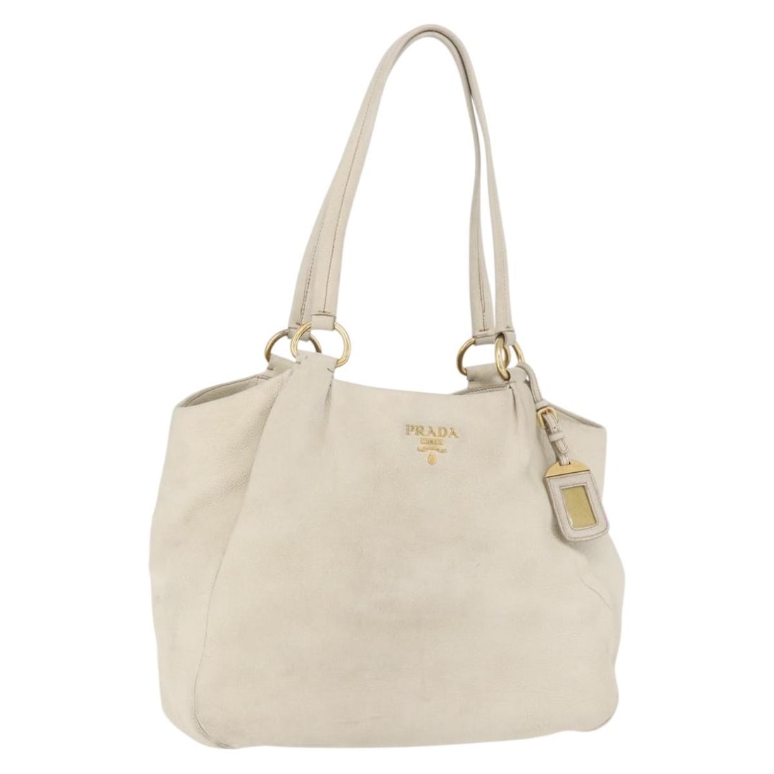 PRADA Leather Ivory Gold Tote Bag with Name Tag: PRADA Leather Ivory Gold Tote Bag with Name Tag This PRADA tote bag is crafted from leather in an elegant ivory and gold color combination. Designed for women, it features a spacious interior, a name 