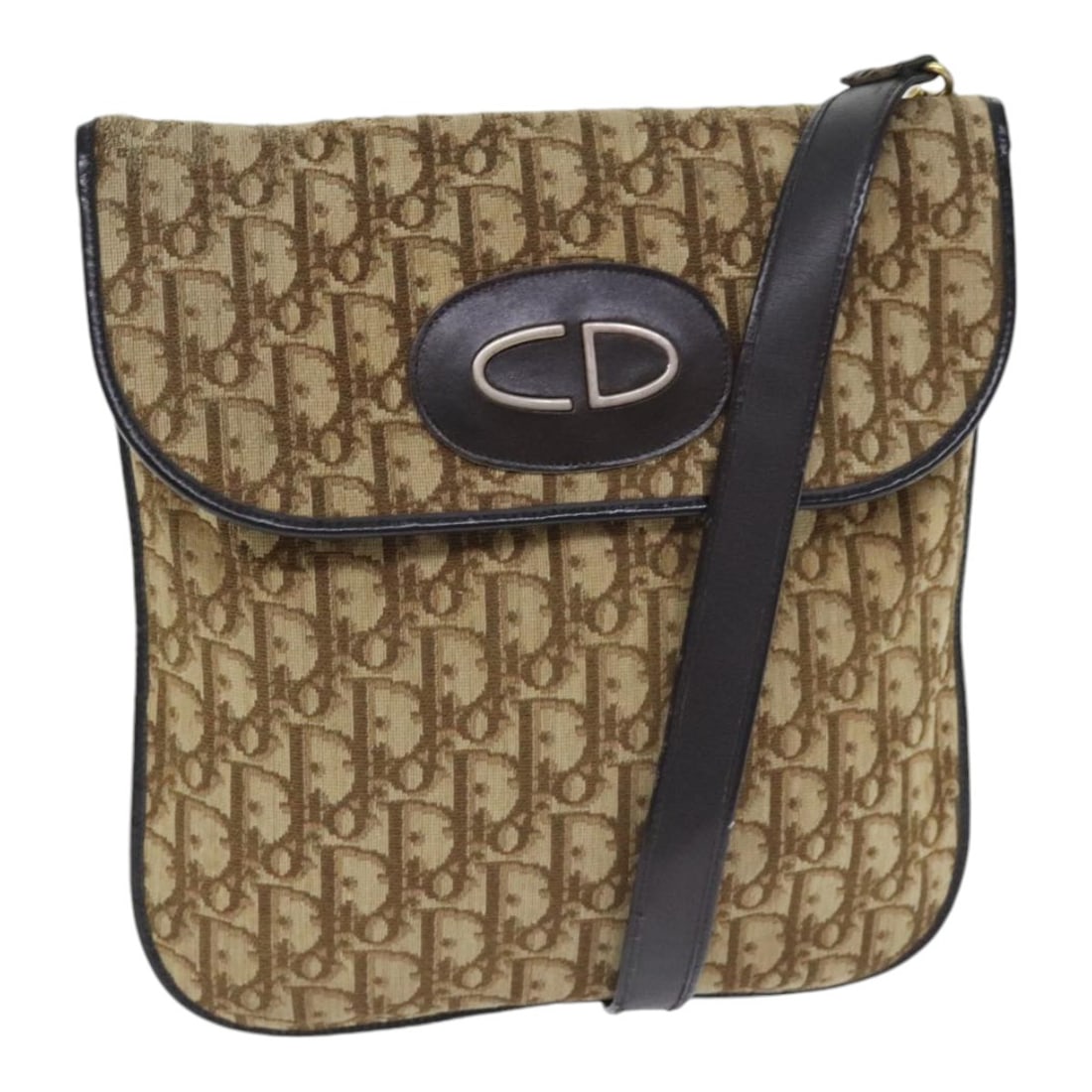 Beige Dior Shoulder Bag Trotter Canvas Pattern for Women: Beige Dior Shoulder Bag Trotter Canvas Pattern for Women This Christian Dior Trotter Canvas shoulder bag features a beige canvas exterior with the iconic Trotter pattern. Designed for women, the bag o