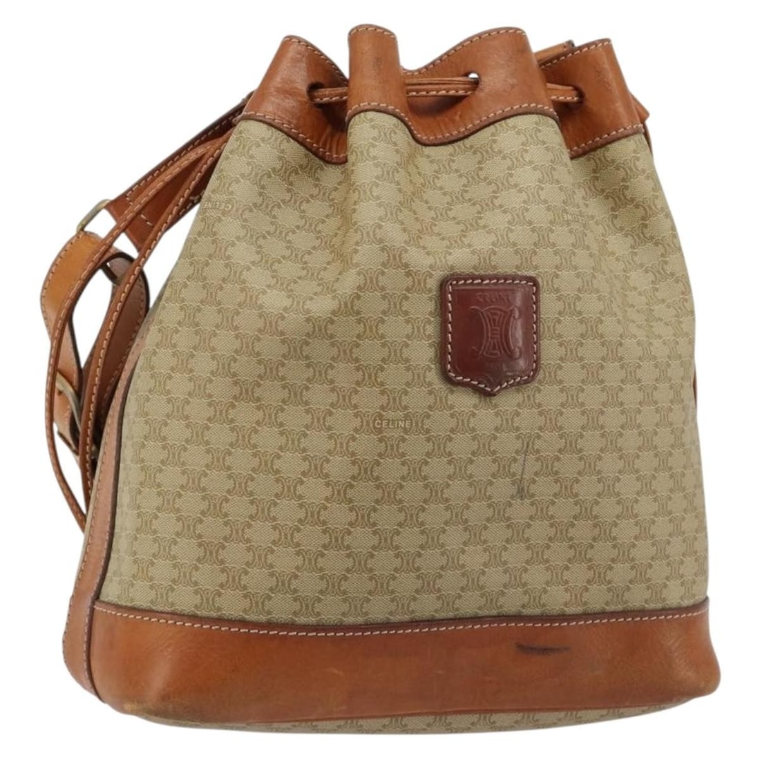 Celine Macadam PVC Canvas Shoulder Bag Beige Gold Tone: Celine Macadam PVC Canvas Shoulder Bag Beige Gold Tone A CELINE shoulder bag in beige and gold, made from PVC leather and Macadam canvas. It features a shoulder drop of approximately 37 - 38 cm and wa