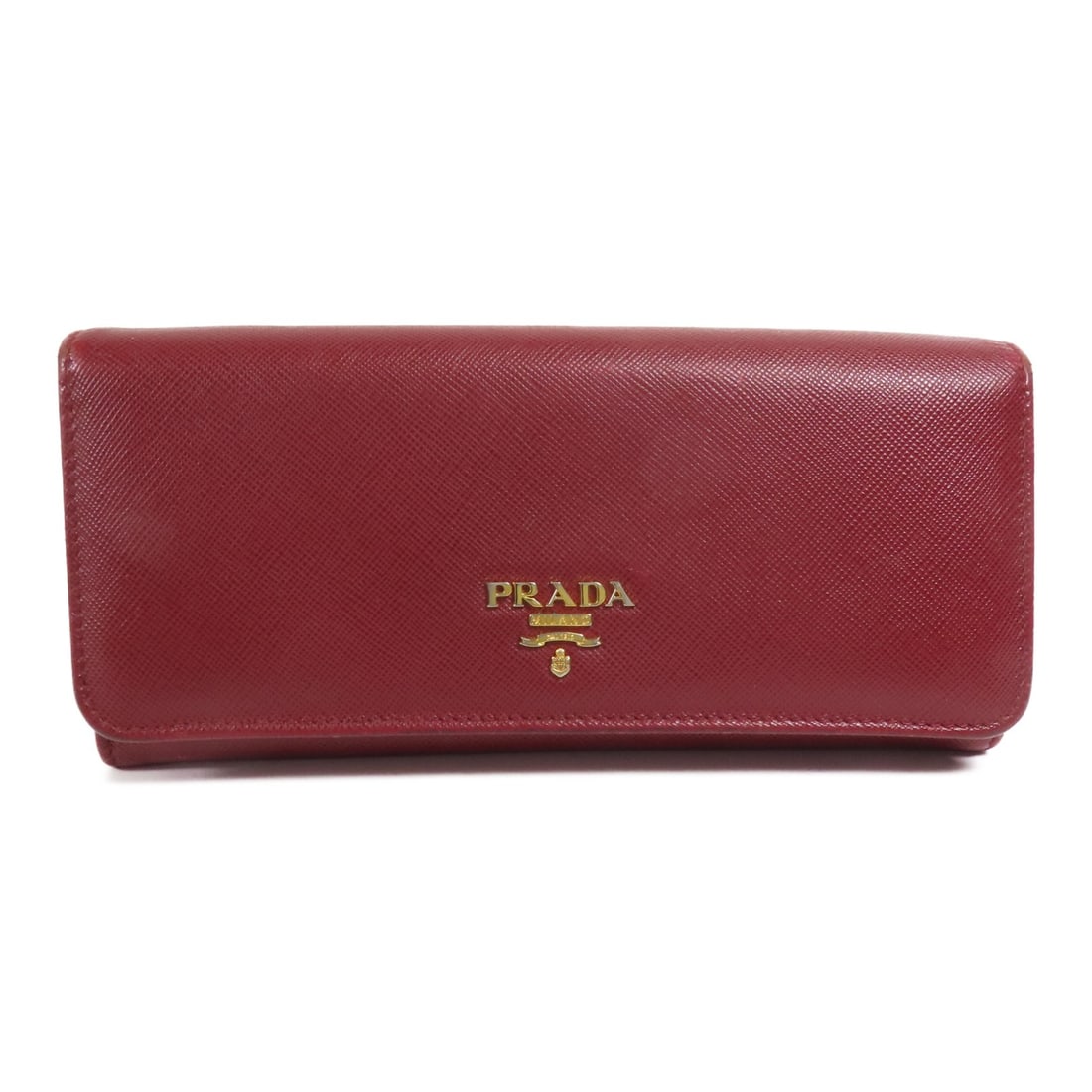 Prada 1M1132 calfskin long wallet red gold tone hardware: Prada 1M1132 calfskin long wallet red gold tone hardware Long wallet in red calfskin leather with a hook button closure. It features four open pockets, 10 card slots, and two coin cases. The item is h
