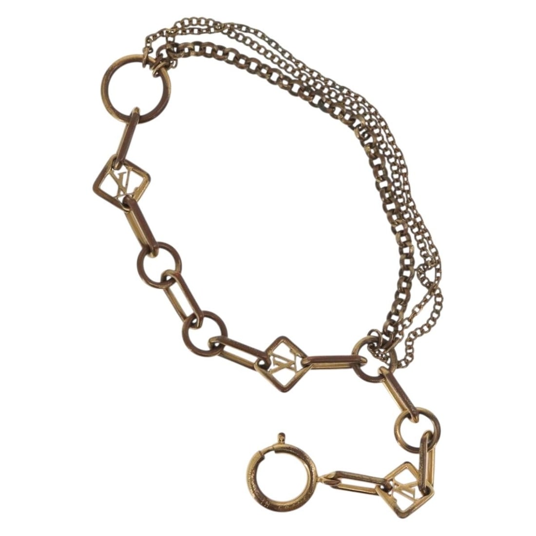 Louis Vuitton M65362 gold tone metal bracelet France: Louis Vuitton M65362 gold tone metal bracelet France Louis Vuitton bracelet in metal with a gold tone finish, made in France. The piece is identified as style M65362 and is intended for women. It meas