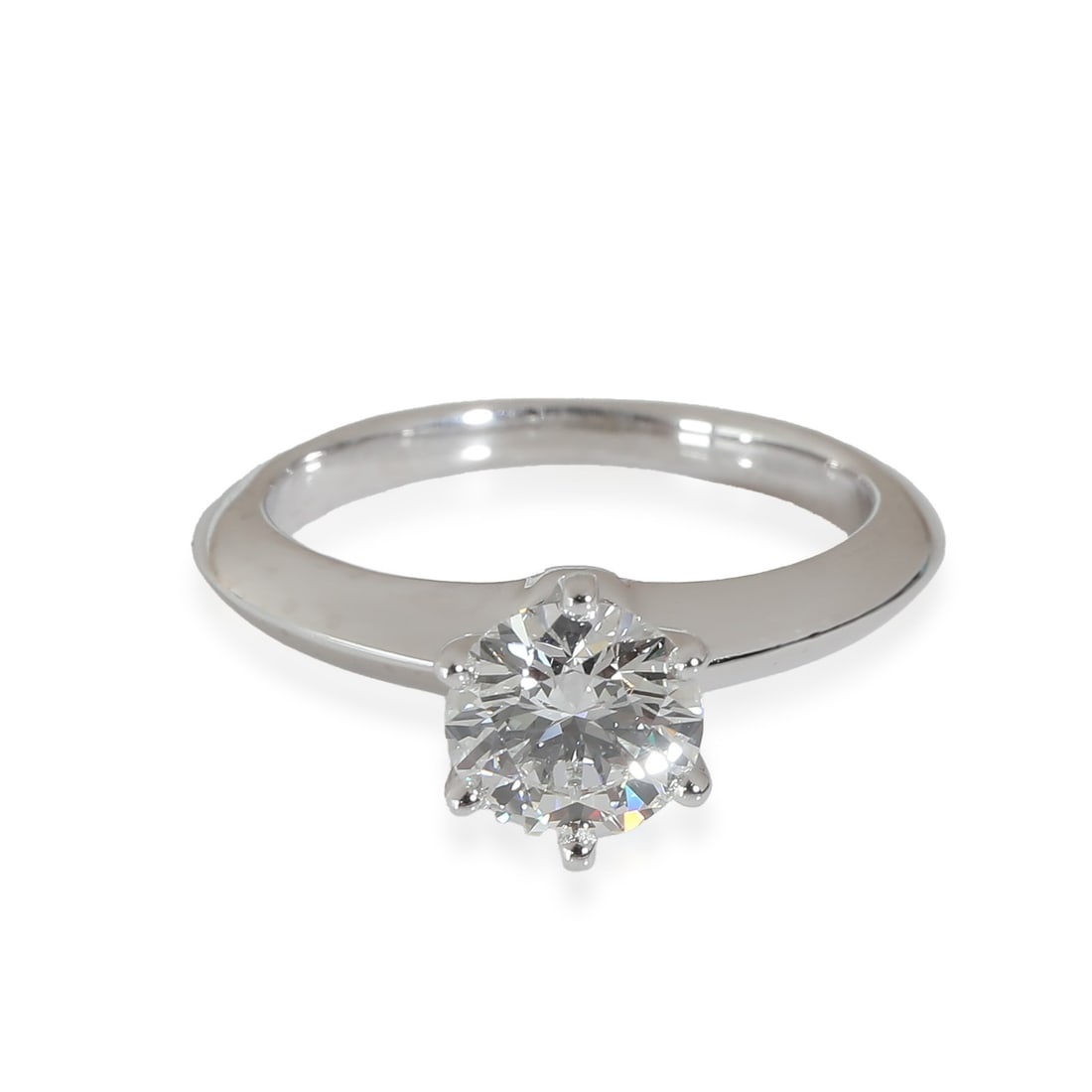 Tiffany & Co. Platinum 0.90 ct Engagement Ring with Certificate: Tiffany & Co. Platinum 0.90 ct Engagement Ring with Certificate This exquisite engagement ring from Tiffany & Co. features a stunning round brilliant cut diamond weighing 0.90 carats. Crafted from hig