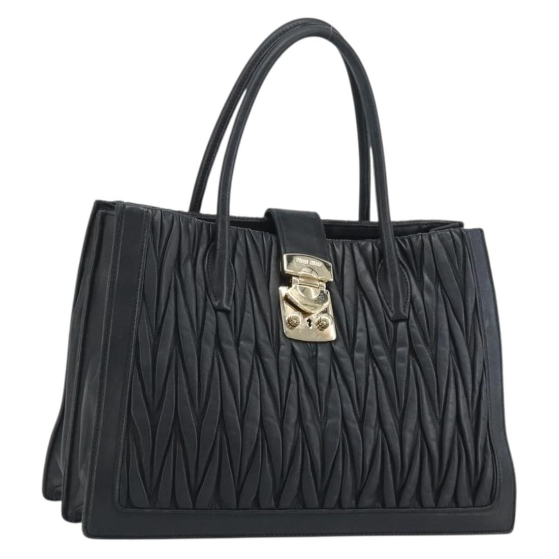 Miu Miu Matelasse Leather Handbag Black Gold Tone Italy: Miu Miu Matelasse Leather Handbag Black Gold Tone Italy Miu Miu Matelasse hand bag in black and gold leather, made in Italy. It comes with a guarantee card and has a serial number 53. The bag is heavi