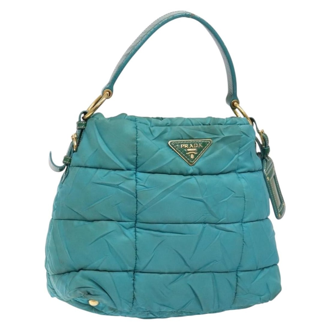 Prada blue gold nylon shoulder bag with name tag: Prada blue gold nylon shoulder bag with name tag This PRADA shoulder bag is crafted from durable nylon in a striking blue and gold color combination. Designed for women, the bag features a spacious in