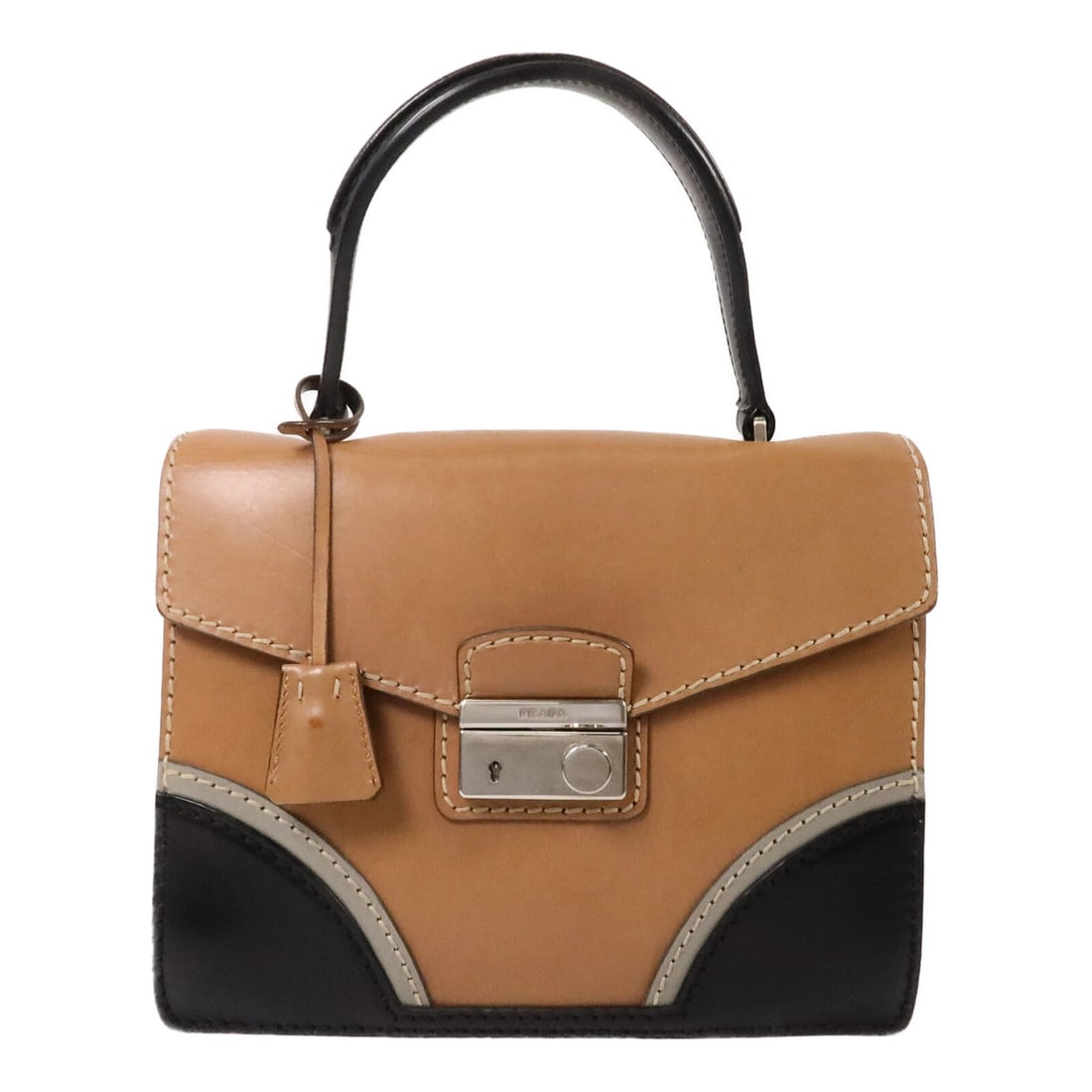 PRADA Vitello Sound Lock Handbag Brown Calfskin Leather SHW: PRADA Vitello Sound Lock Handbag Brown Calfskin Leather SHW A Prada women's handbag in brown calfskin (cowhide) leather. It features a brown exterior and frame color, with a regular size and Italy lis