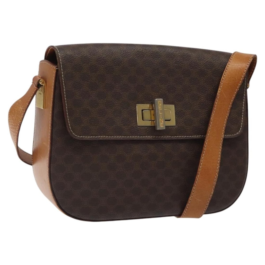 Celine Macadam Brown PVC Leather Shoulder Bag Gold Accents Italy: Celine Macadam Brown PVC Leather Shoulder Bag Gold Accents Italy This Celine Macadam shoulder bag features a brown and gold PVC leather and Macadam canvas exterior with gold-tone accents. Designed for