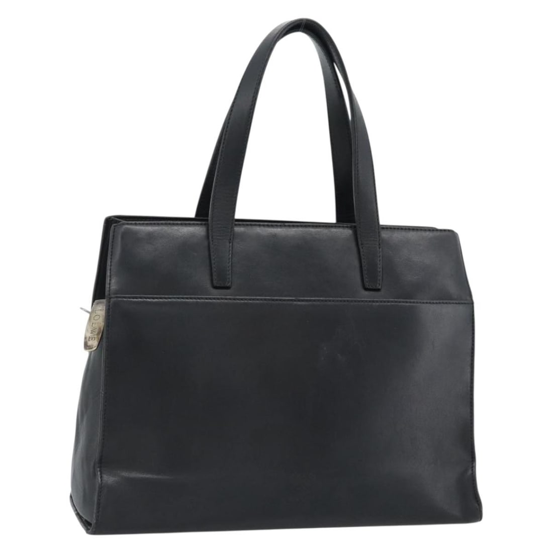 LOEWE Black Leather Hand Bag Silver Tone Spain: LOEWE Black Leather Hand Bag Silver Tone Spain LOEWE black and silver leather hand bag made in Spain. This women's handbag features a handle drop of approximately 5.9 inches (15 cm) and measures appro