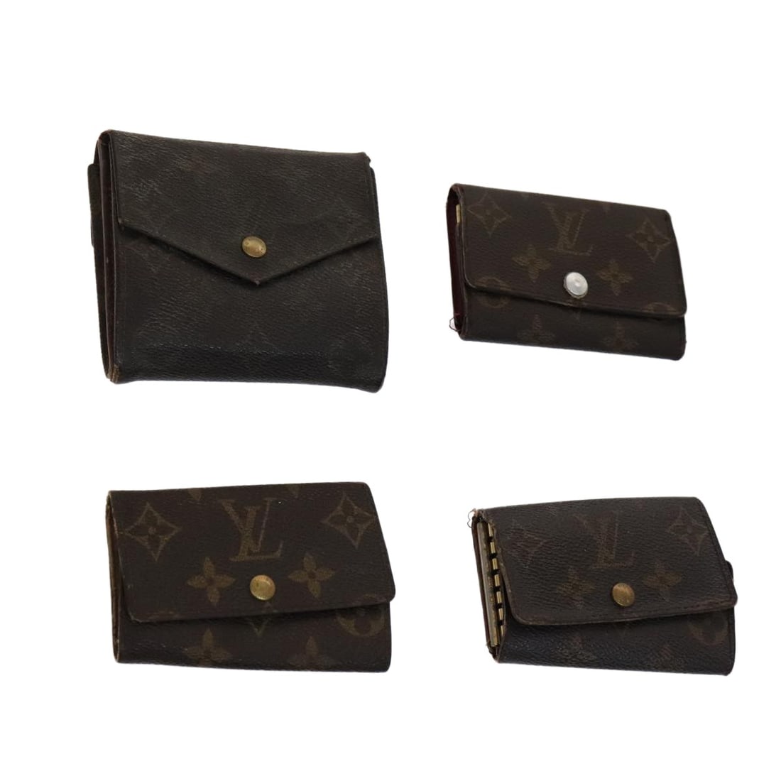 Louis Vuitton Monogram Canvas Key Case Wallet: Louis Vuitton Monogram Canvas Key Case Wallet This Louis Vuitton Monogram key case wallet features the iconic Monogram Canvas material and is designed for women. The wallet shows significant signs of 