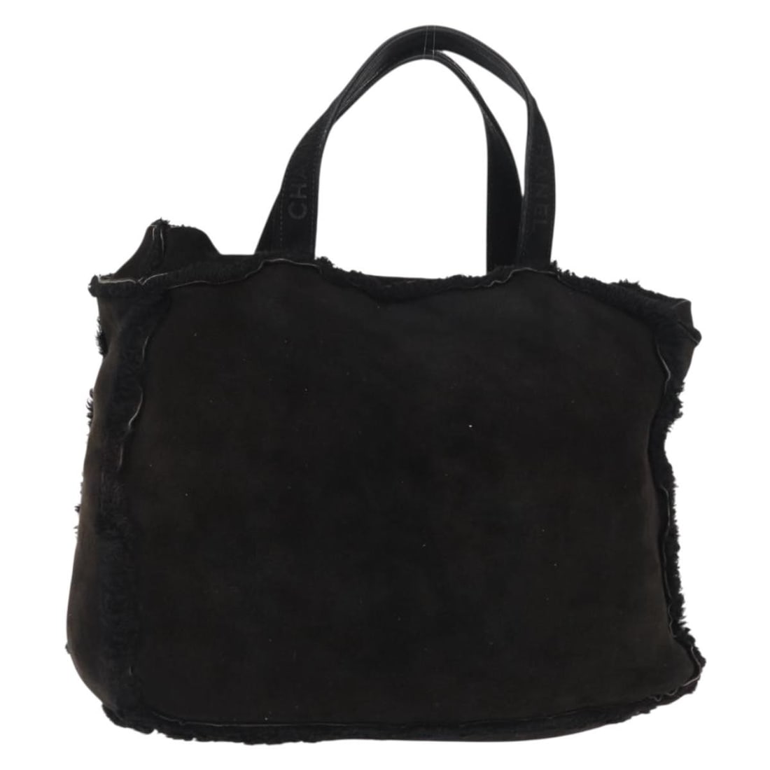 CHANEL Black Canvas Tote Bag Made in France: CHANEL Black Canvas Tote Bag Made in France Black Chanel tote bag made in France. This women's bag is offered as the item only, without the original box or dust bag. Condition is heavily used, with lo