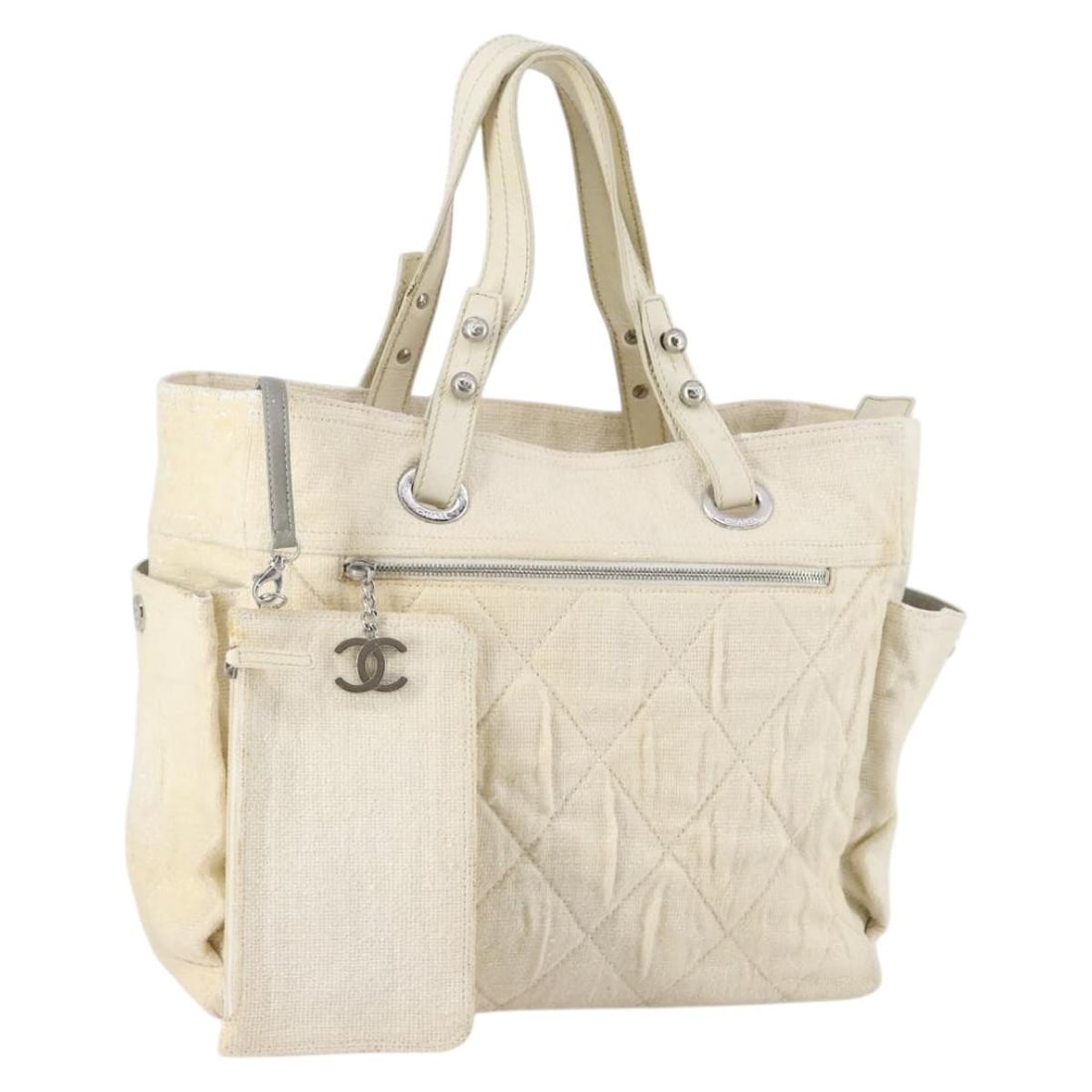 Chanel Paris Biarritz GM White Silver Coated Canvas Tote with Pouch: Chanel Paris Biarritz GM White Silver Coated Canvas Tote with Pouch Chanel Paris Biarritz GM tote bag in white and silver coated canvas, made in Italy. It comes with a pouch and features a spacious to