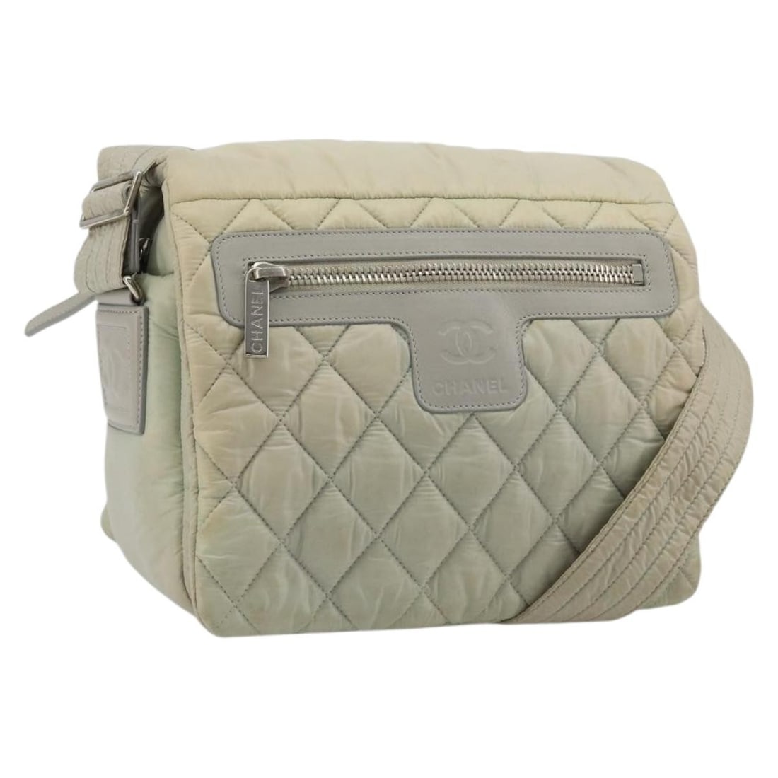 CHANEL Cococoon Nylon Shoulder Bag Gray Silver with Guarantee Card: CHANEL Cococoon Nylon Shoulder Bag Gray Silver with Guarantee Card A CHANEL Cococoon shoulder bag in gray and silver nylon, made in Italy. It comes with a guarantee card and features a shoulder strap 
