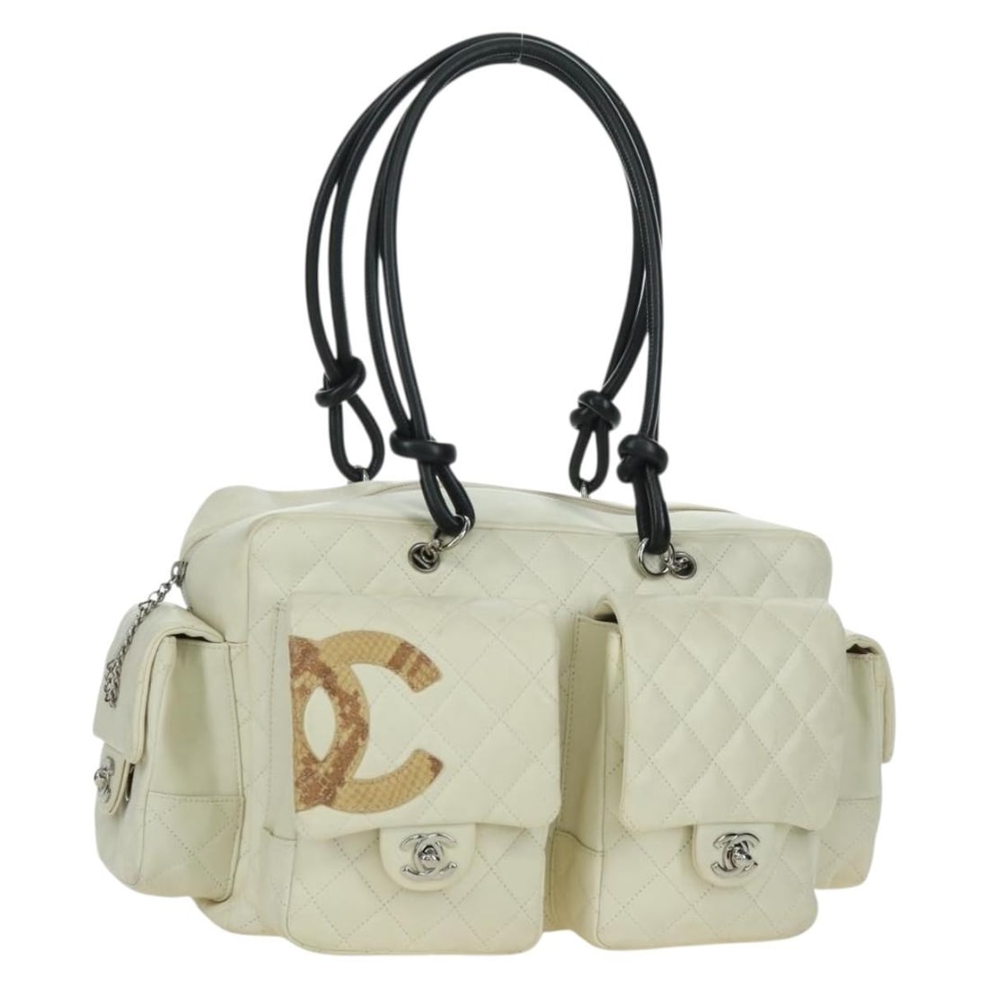 CHANEL Cambon Line white leather matelasse handbag with dust bag: CHANEL Cambon Line white leather matelasse handbag with dust bag A CHANEL Cambon Line Matelasse hand bag in white leather with silver-tone accents. It comes with a dust bag and was made in Italy. The 