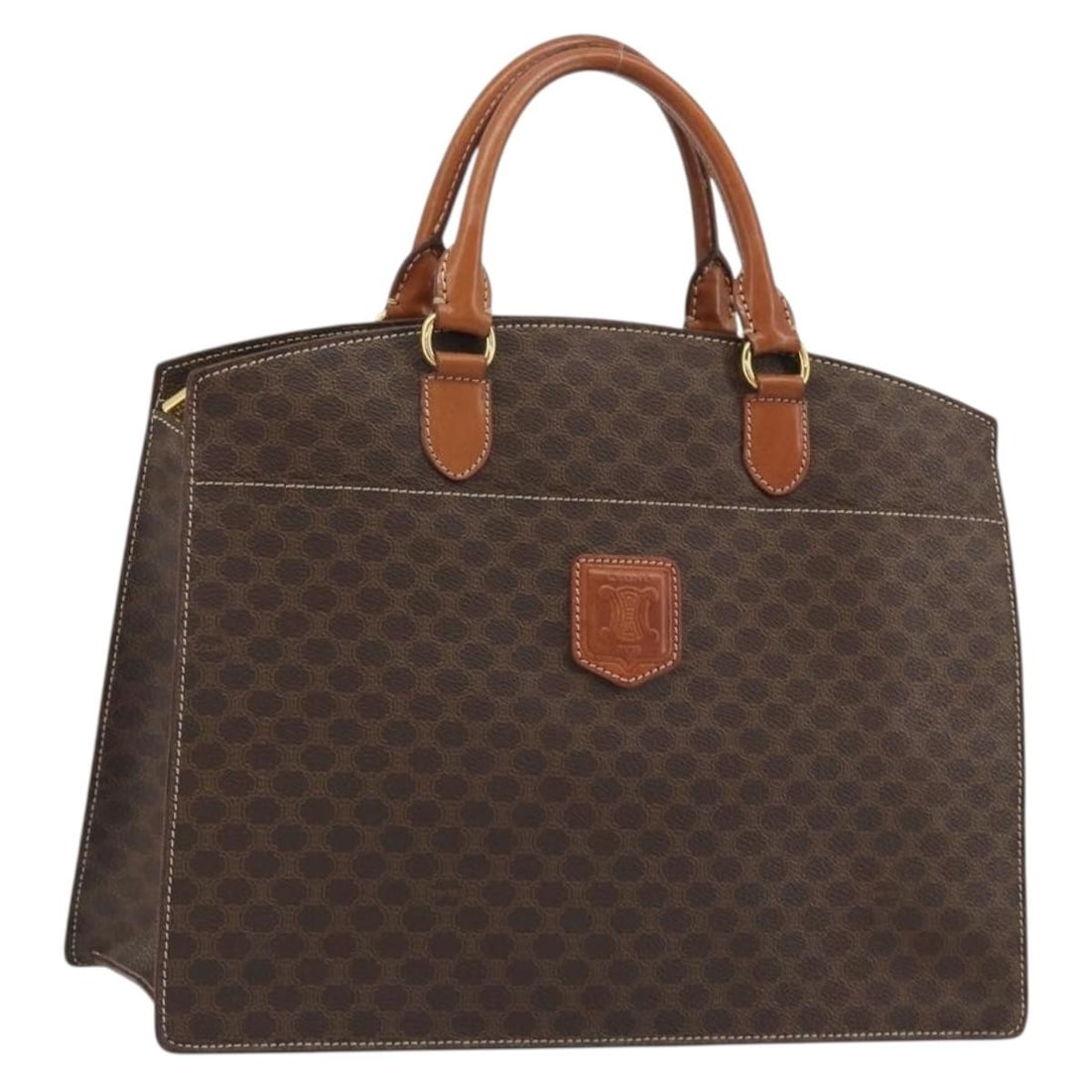 Celine Macadam Brown PVC Leather Canvas Handbag Gold Tone: Celine Macadam Brown PVC Leather Canvas Handbag Gold Tone A CELINE handbag in brown and gold, crafted from PVC leather and Macadam canvas. Made in Italy, this bag measures approximately W35 x H26 x D7