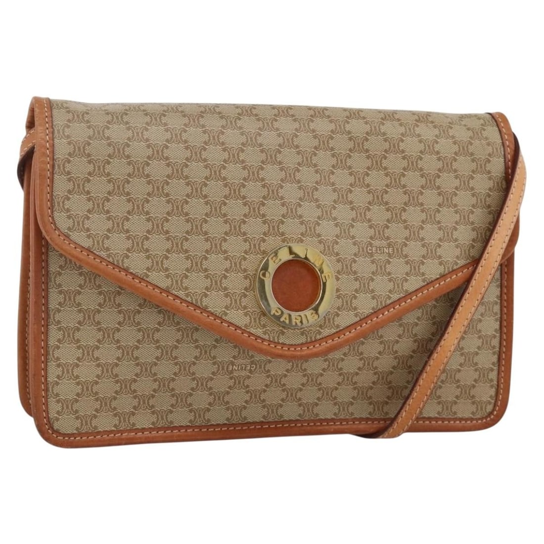 Celine Beige Macadam PVC Shoulder Bag with Gold Accents: Celine Beige Macadam PVC Shoulder Bag with Gold Accents This CELINE Macadam shoulder bag features a beige and gold PVC leather exterior with the iconic Macadam canvas pattern. The bag offers a spaciou