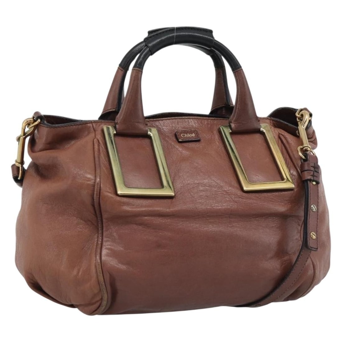 Chloe Etel 2way Leather Shoulder Bag Brown Gold Tone: Chloe Etel 2way Leather Shoulder Bag Brown Gold Tone This is a Chloe Etel 2-way shoulder bag made of leather in brown with gold-tone accents. It comes with a shoulder strap and was made in Hungary. Th