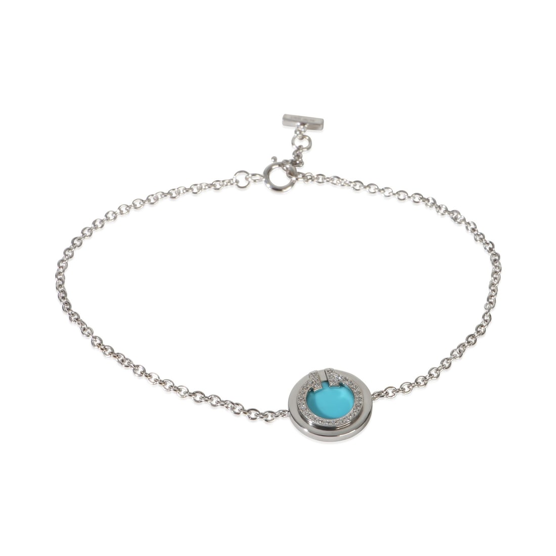 Tiffany & Co. Tiffany T Circle Bracelet 18k White Gold Turquoise Diamond: Tiffany & Co. Tiffany T Circle Bracelet 18k White Gold Turquoise Diamond Pre-owned Tiffany & Co. Tiffany T Circle bracelet crafted in 18k white gold with a turquoise centerpiece and round brilliant di