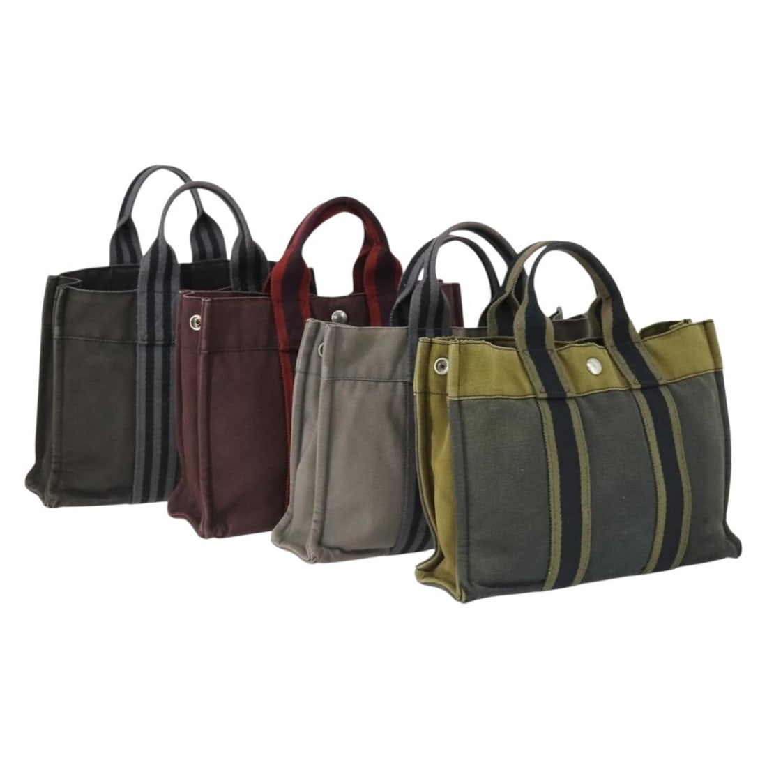 Set of 4 Hermes Fourre Tout canvas handbags gray black red: Set of 4 Hermes Fourre Tout canvas handbags gray black red Hermes Fourre Tout hand bag in canvas with a gray, black, and red exterior. Made in France, this women's handbag is offered as the item shown