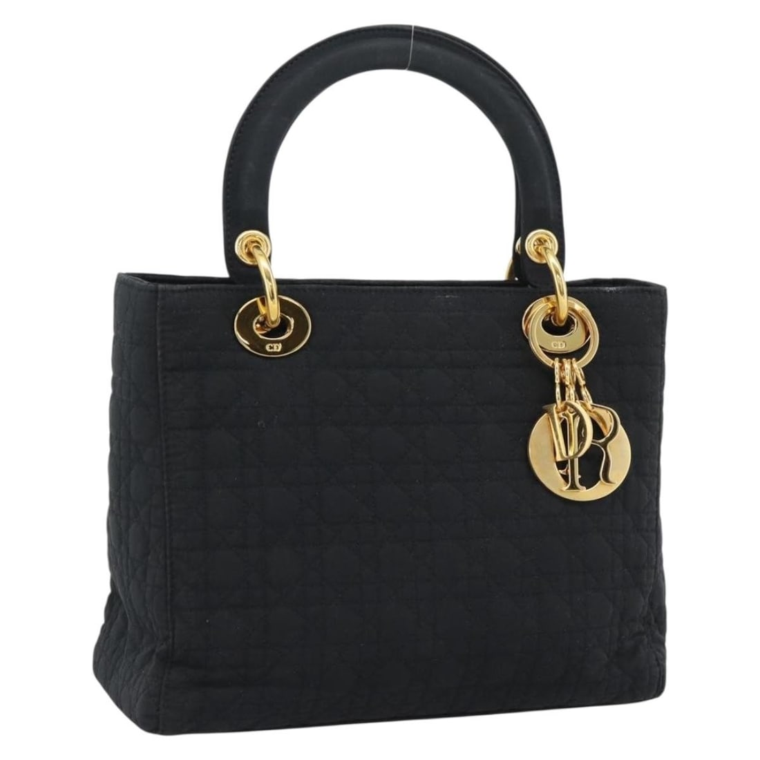 Christian Dior Cannage Canvas Hand Bag Black Gold Tone: Christian Dior Cannage Canvas Hand Bag Black Gold Tone Christian Dior Canage hand bag in black canvas with gold tone exterior details, made in Italy. The bag measures approximately 9.4 x 7.5 x 3.9 inc