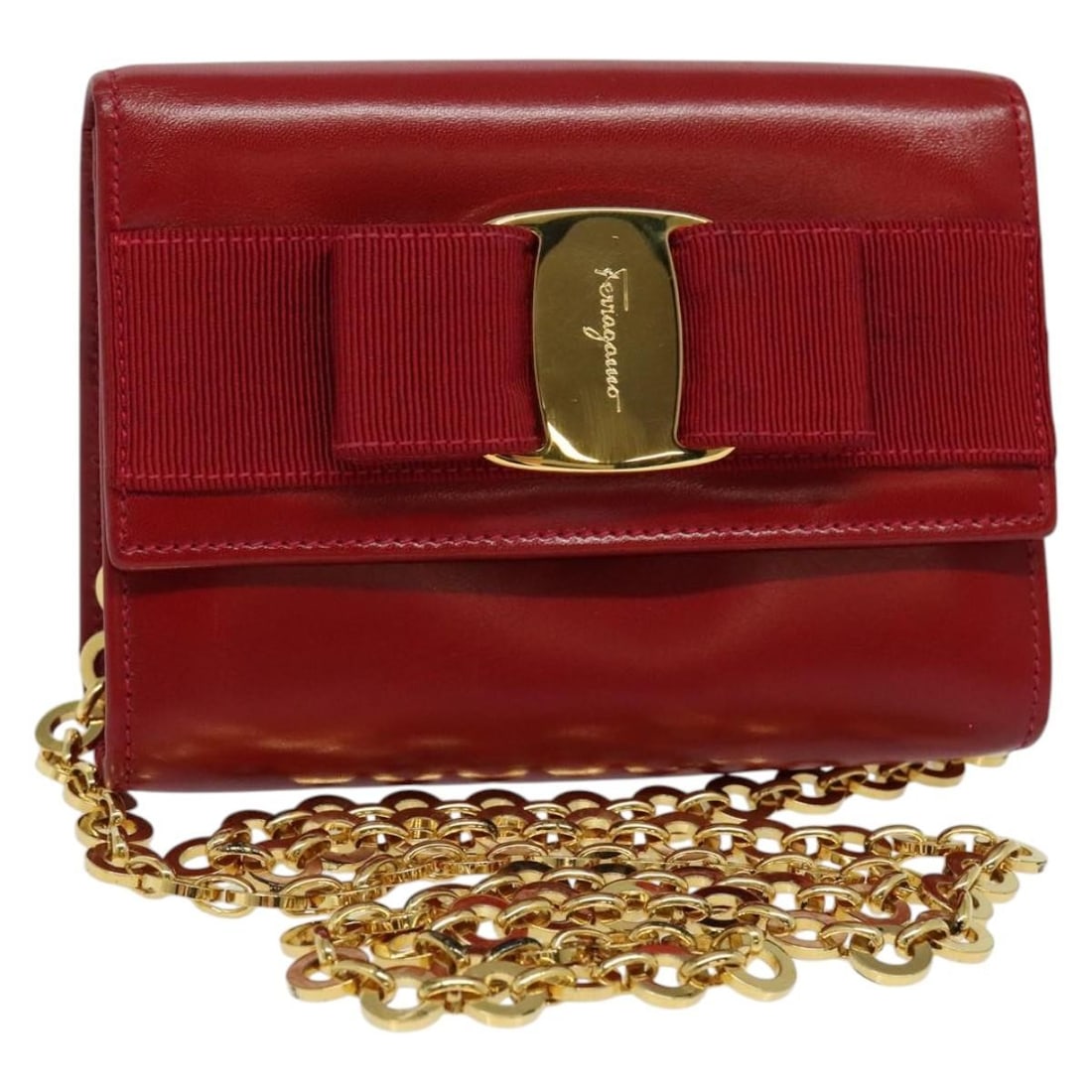 Salvatore Ferragamo Vala Chain Mini Shoulder Bag Leather Red Gold: Salvatore Ferragamo Vala Chain Mini Shoulder Bag Leather Red Gold This Salvatore Ferragamo Vala Chain Mini Shoulder Bag is a stylish accessory crafted from premium leather in a striking red and gold c