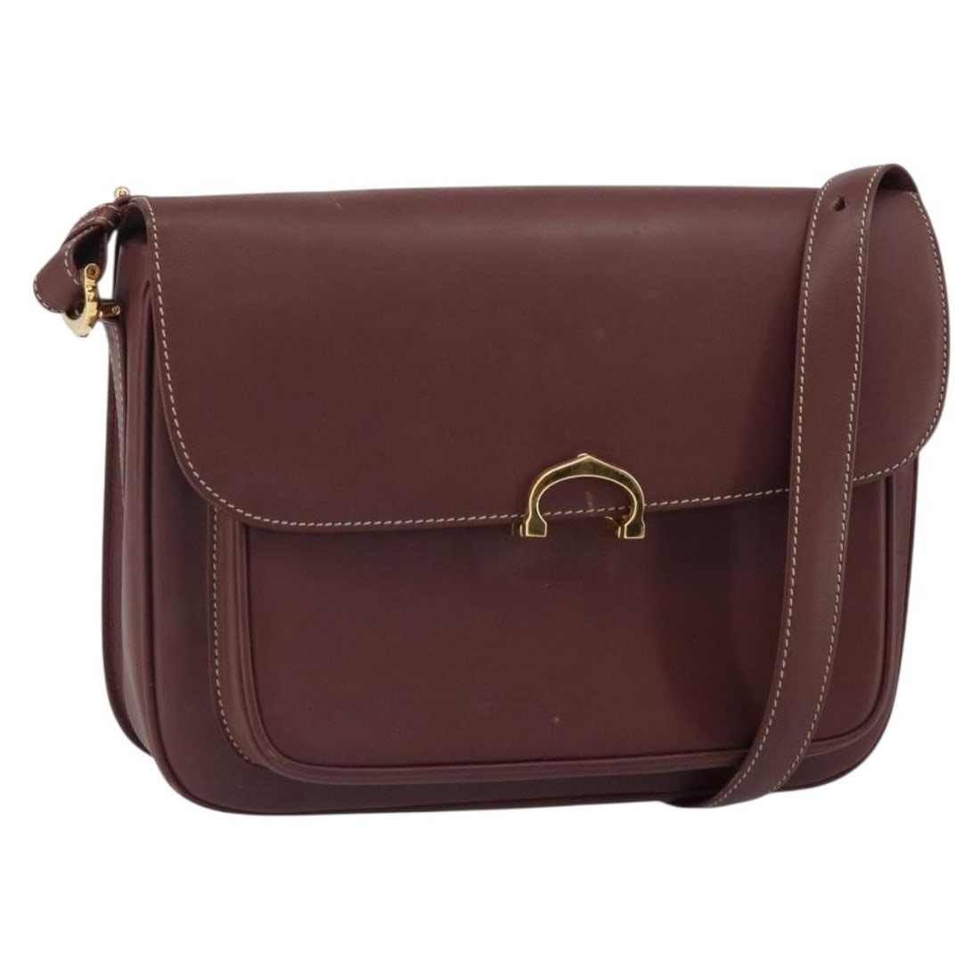 Cartier Must Line Bordeaux Leather Shoulder Bag Gold Accents France: Cartier Must Line Bordeaux Leather Shoulder Bag Gold Accents France This is a Cartier Must Line shoulder bag crafted from Bordeaux leather with gold-tone accents. The bag features an adjustable should