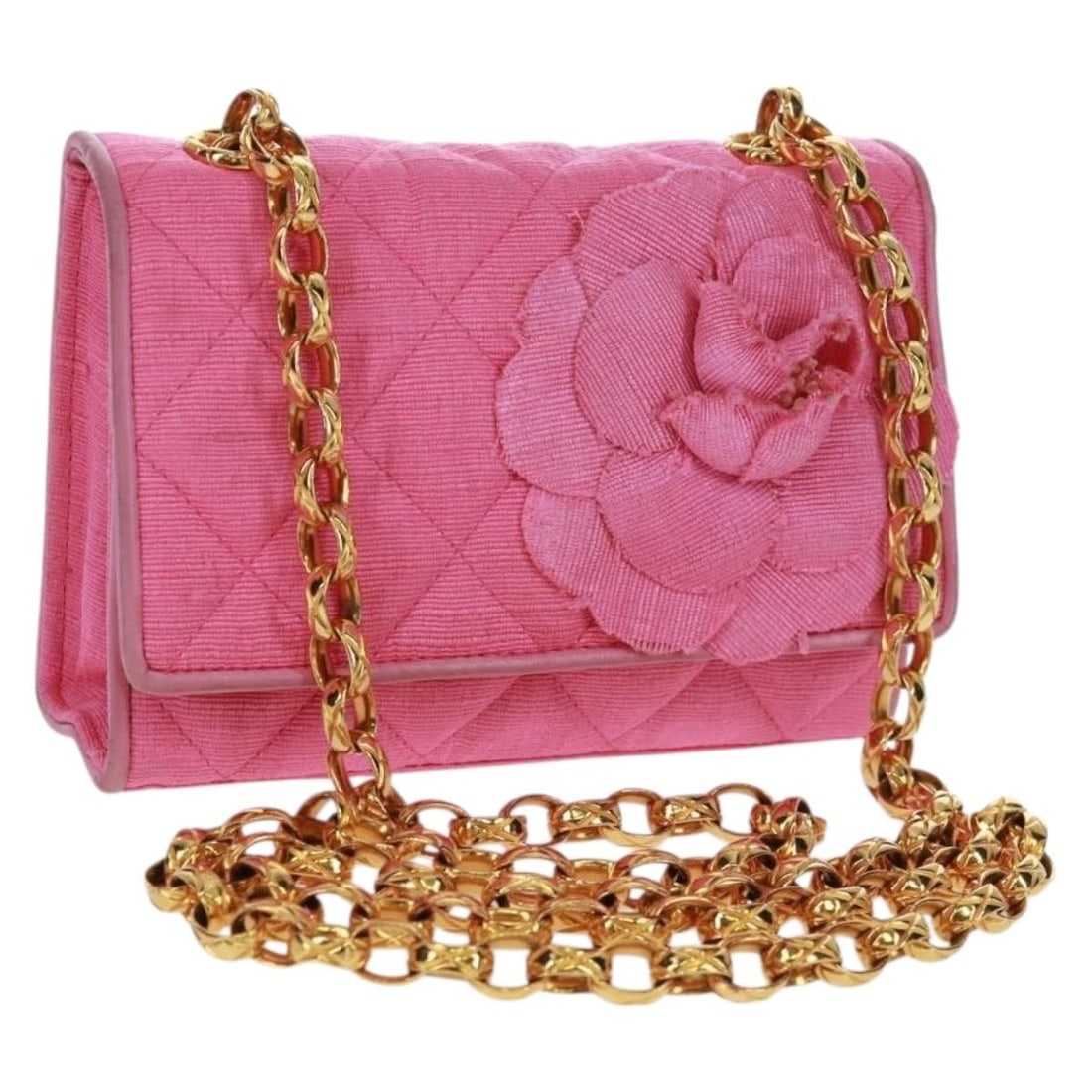 Chanel Camelia Pink Cotton Matelasse Shoulder Bag with Chain and Gold CC: Chanel Camelia Pink Cotton Matelasse Shoulder Bag with Chain and Gold CC This CHANEL Matelasse Camelia shoulder bag features a pink and gold cotton exterior with a chain strap and CC accents. The bag 