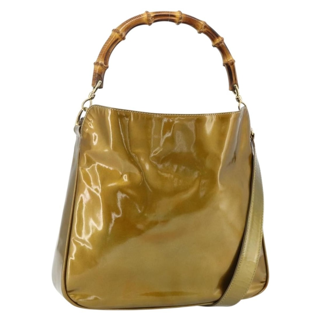 Gucci Bamboo patent leather gold handbag with shoulder strap: Gucci Bamboo patent leather gold handbag with shoulder strap This GUCCI Bamboo Hand Bag features a gold patent leather exterior and offers versatile carrying options with both handle and shoulder stra