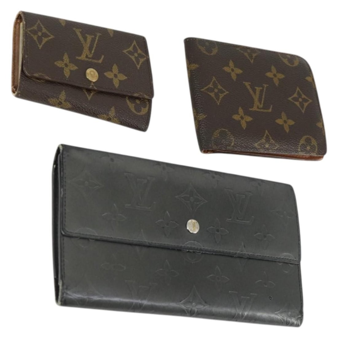 Set of 3 Louis Vuitton Monogram Canvas Wallets: Set of 3 Louis Vuitton Monogram Canvas Wallets This is a set of three Louis Vuitton wallets crafted from iconic Monogram Canvas. Made in France, each wallet features the signature monogram pattern and