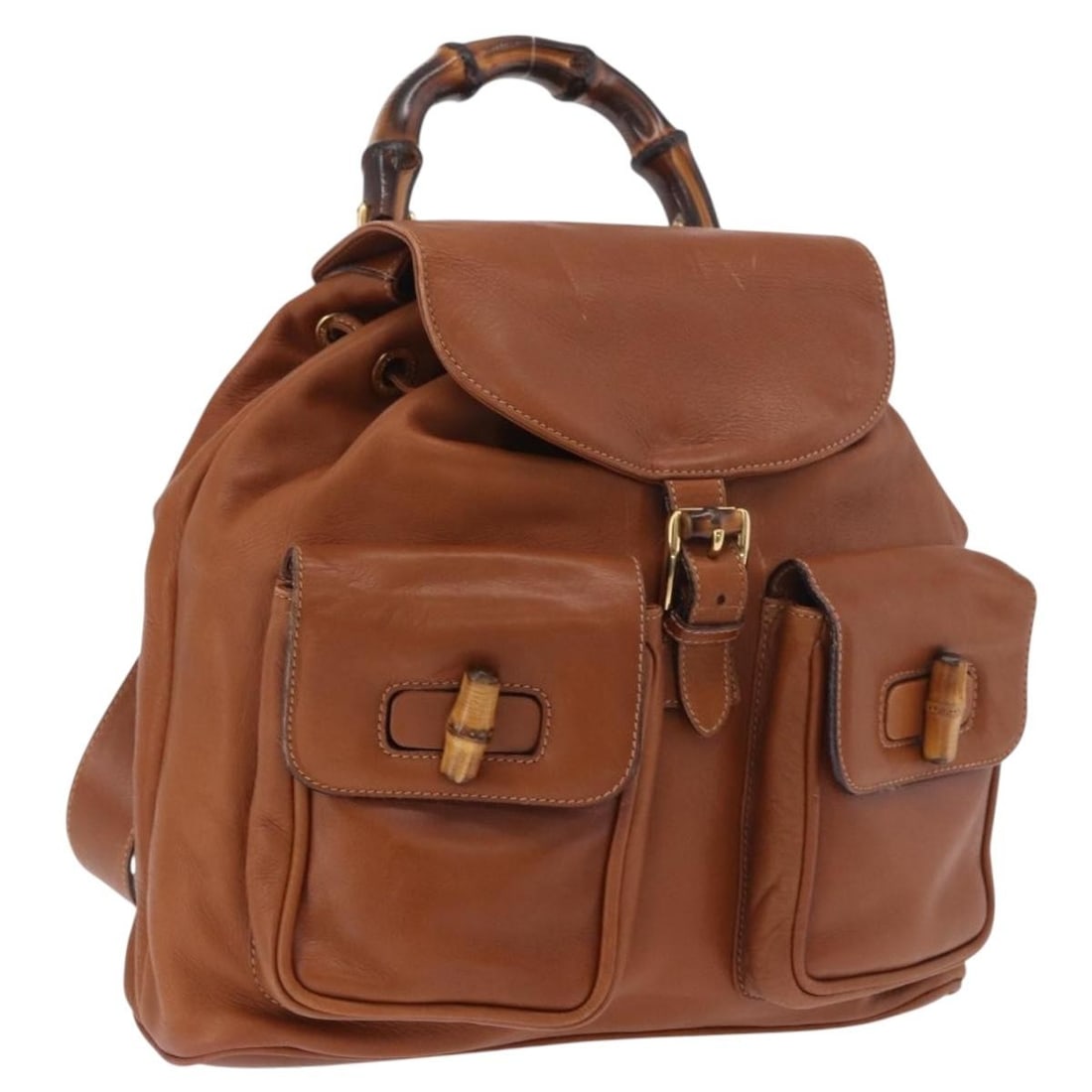 Gucci Bamboo Leather Backpack Brown Gold Tone 003 58 0016: Gucci Bamboo Leather Backpack Brown Gold Tone 003 58 0016 GUCCI Bamboo Backpack in brown and gold leather, made in Italy. This backpack features a bamboo design and measures approximately W30 cm x H28