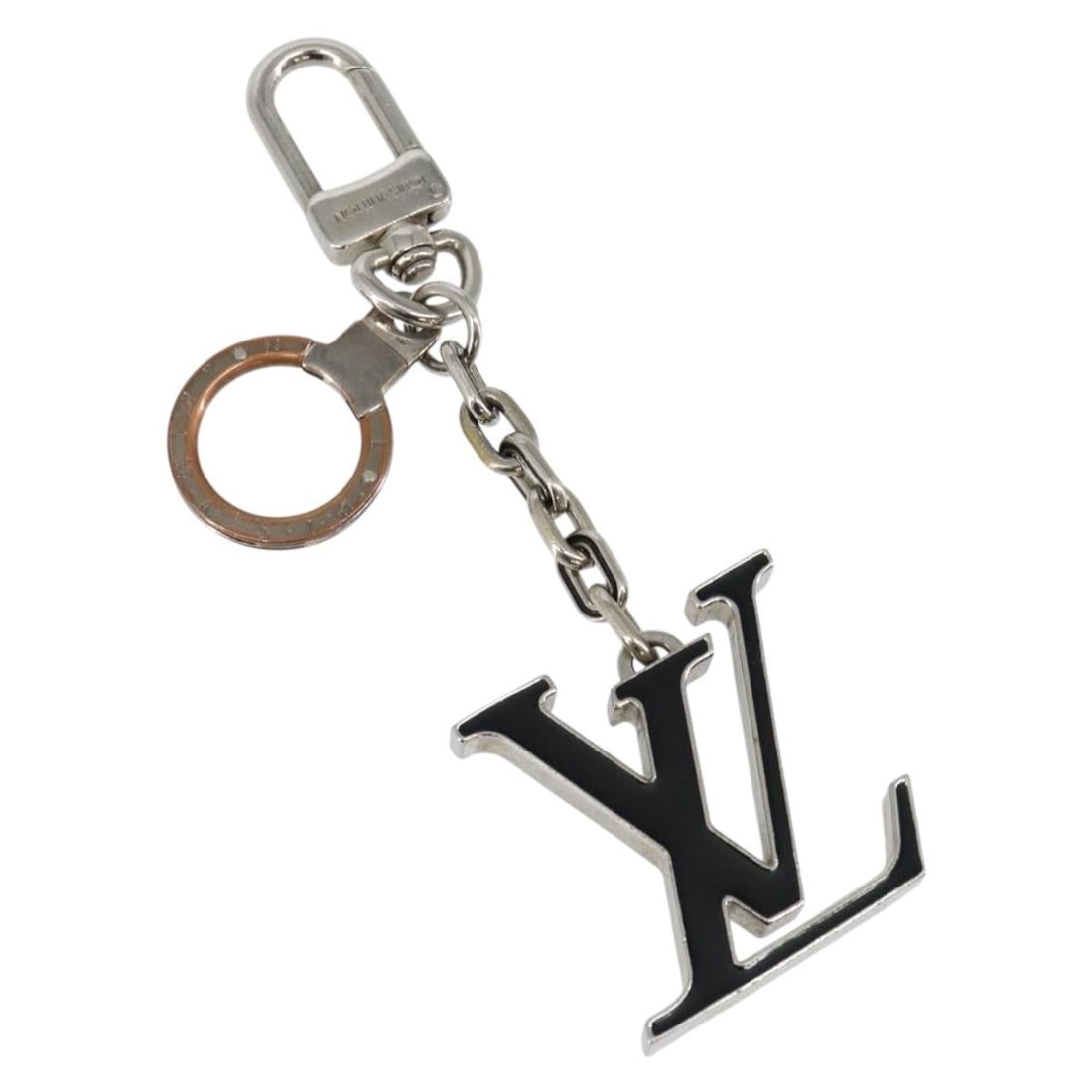 Louis Vuitton M65071 Silver Metal Charm Porte Cre: Louis Vuitton M65071 Silver Metal Charm Porte Cre This authentic Louis Vuitton Porte Cre Printed Initials LV Charm is a stylish accessory crafted from durable metal in a sleek silver finish. Measuring