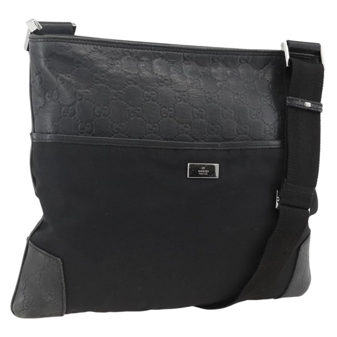 Gucci Guccissima Black Canvas Shoulder Bag with Silver Accents 161822: Gucci Guccissima Black Canvas Shoulder Bag with Silver Accents 161822 This is a GUCCI Guccissima shoulder bag crafted from black and silver canvas. Designed for women, it features an adjustable should