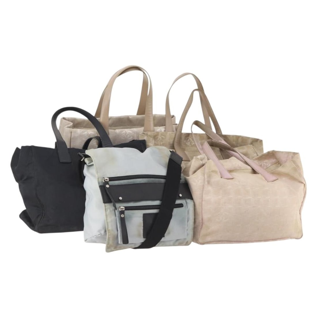 5 Piece Chanel New Travel Line Nylon Tote Bag Set Beige Black: 5 Piece Chanel New Travel Line Nylon Tote Bag Set Beige Black CHANEL New Travel Line tote bag in beige and black nylon. This special set is offered as shown in the photo and does not include the origi