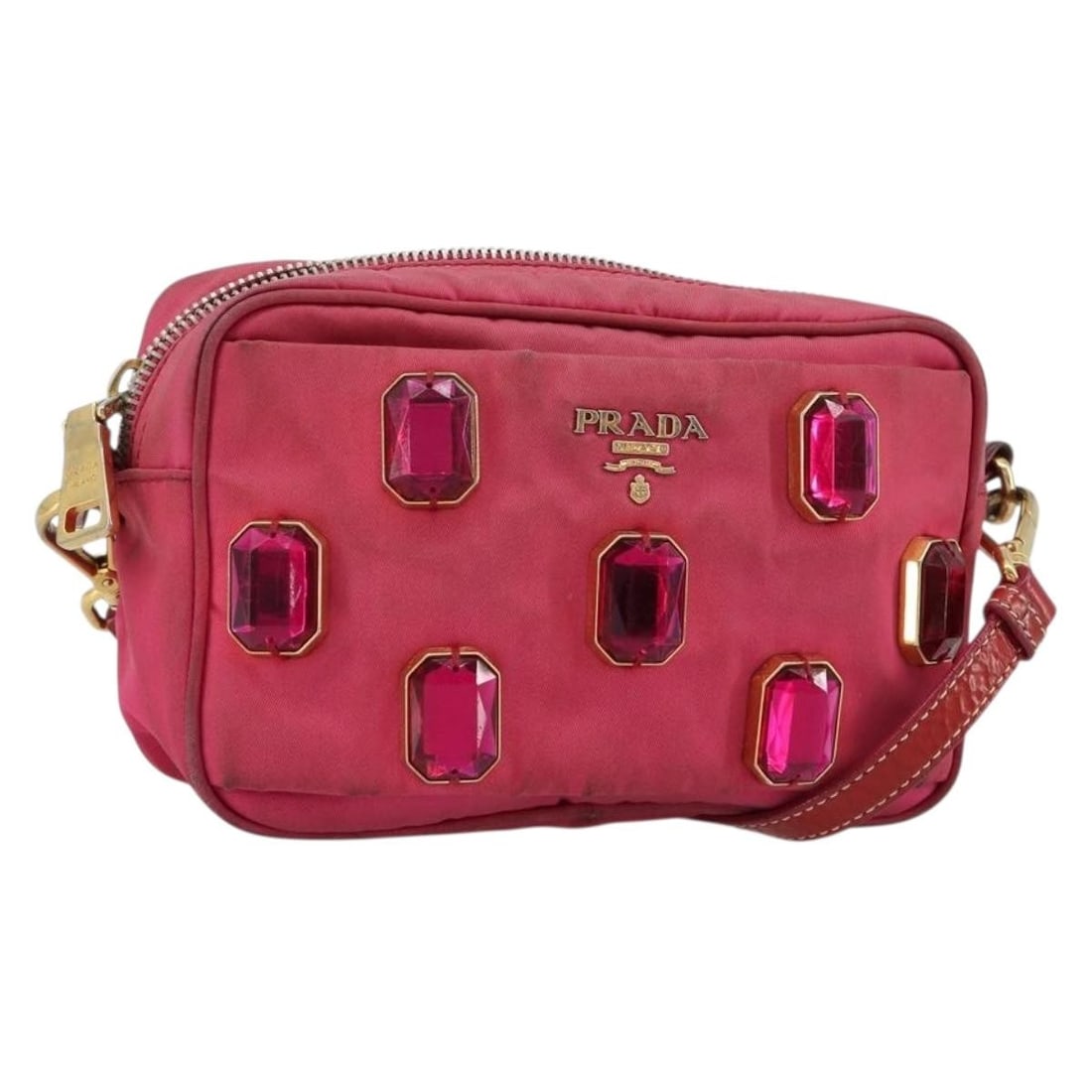 PRADA Nylon Shoulder Bag in Pink with Gold Tone Hardware: PRADA Nylon Shoulder Bag in Pink with Gold Tone Hardware Authentic Prada shoulder bag in pink nylon with gold-tone accents. This women's bag is made in Italy and features a compact silhouette with an 