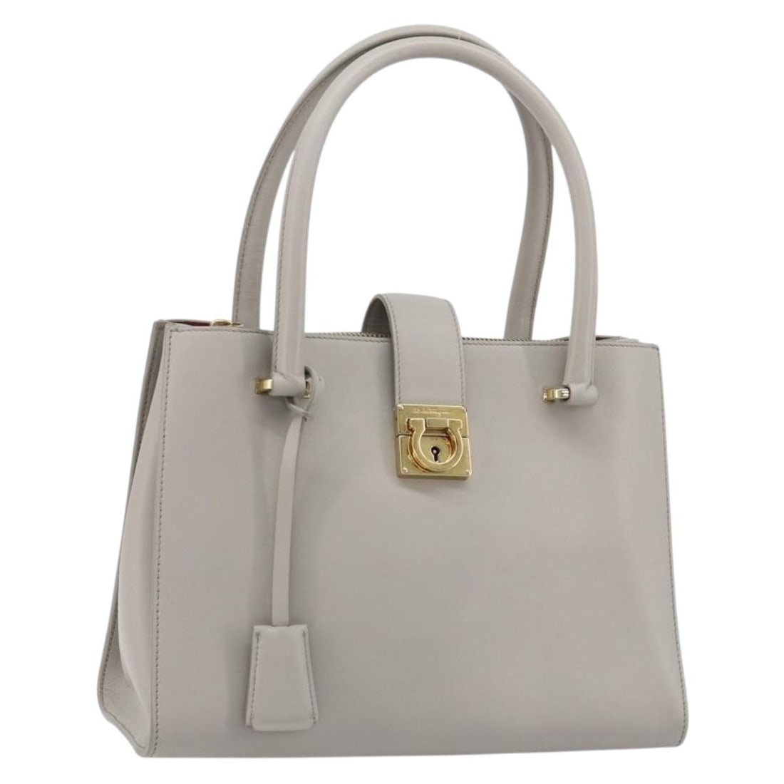 Salvatore Ferragamo Gancini Gray Leather Handbag Key Clochette: Salvatore Ferragamo Gancini Gray Leather Handbag Key Clochette Salvatore Ferragamo Gancini hand bag in leather with a gray and gold color combination. Made in Italy, this women's bag measures approxim