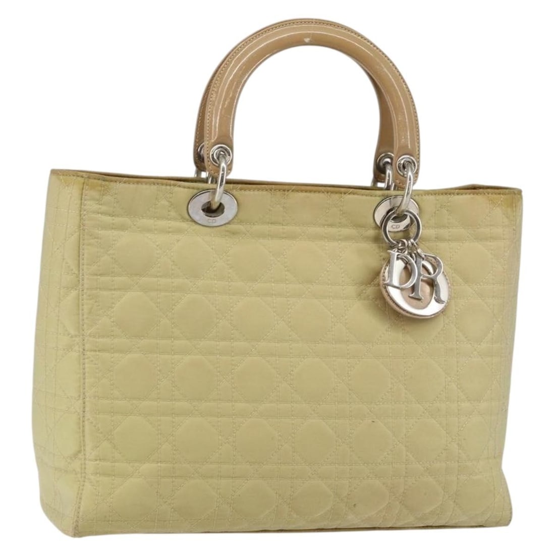 Christian Dior Beige Silver Nylon Canage Hand Bag Auth Made in Italy: Christian Dior Beige Silver Nylon Canage Hand Bag Auth Made in Italy This Christian Dior Canage Hand Bag is crafted from durable nylon in a stylish beige and silver color combination. It features a sp