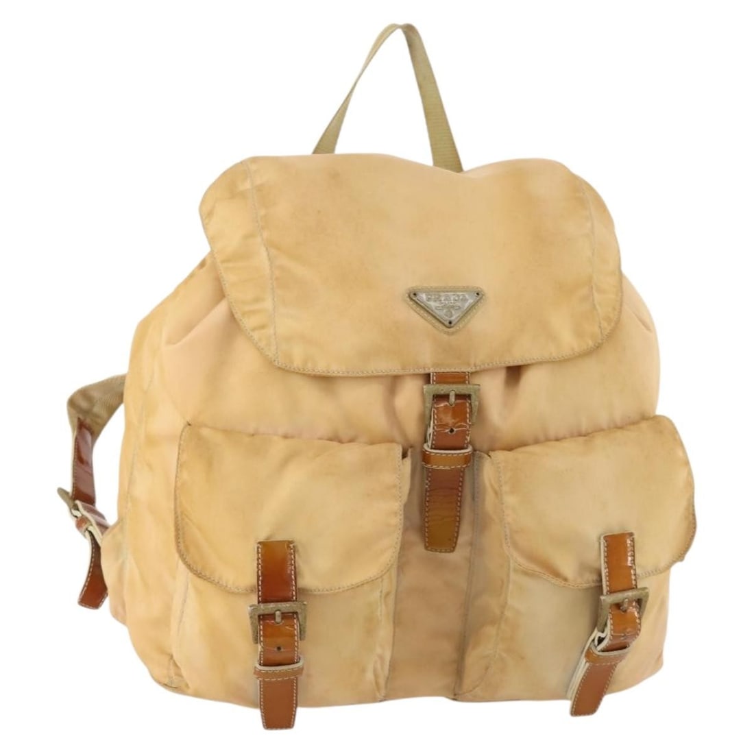 Prada Beige Nylon Backpack Silver Tone Made in Italy: Prada Beige Nylon Backpack Silver Tone Made in Italy Beige and silver backpack in nylon, made in Italy. The item is described as heavily used and shows wear throughout, including loss of shape, rubbin