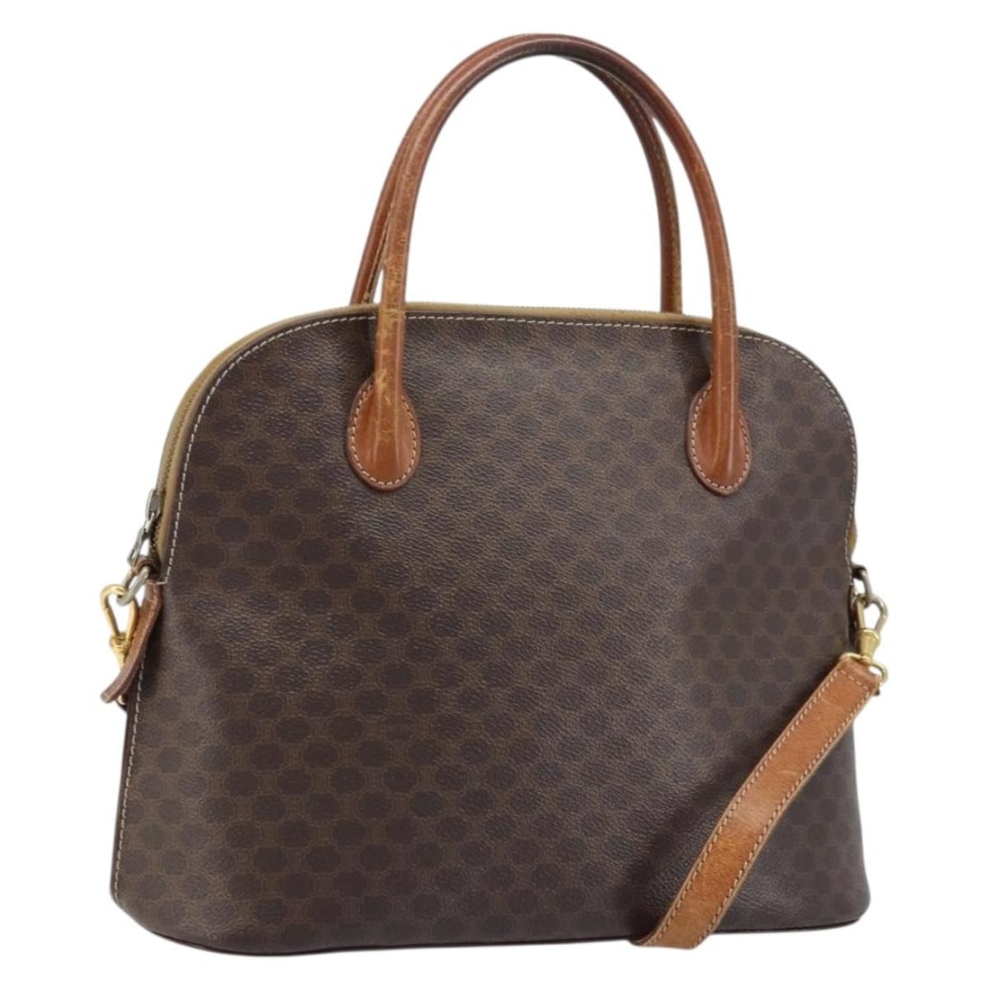 Celine Macadam Brown PVC Leather Shoulder and Handbag with Gold Accents: Celine Macadam Brown PVC Leather Shoulder and Handbag with Gold Accents This CELINE Macadam canvas hand bag features brown and gold PVC leather and the iconic Macadam canvas design. Designed to be wor