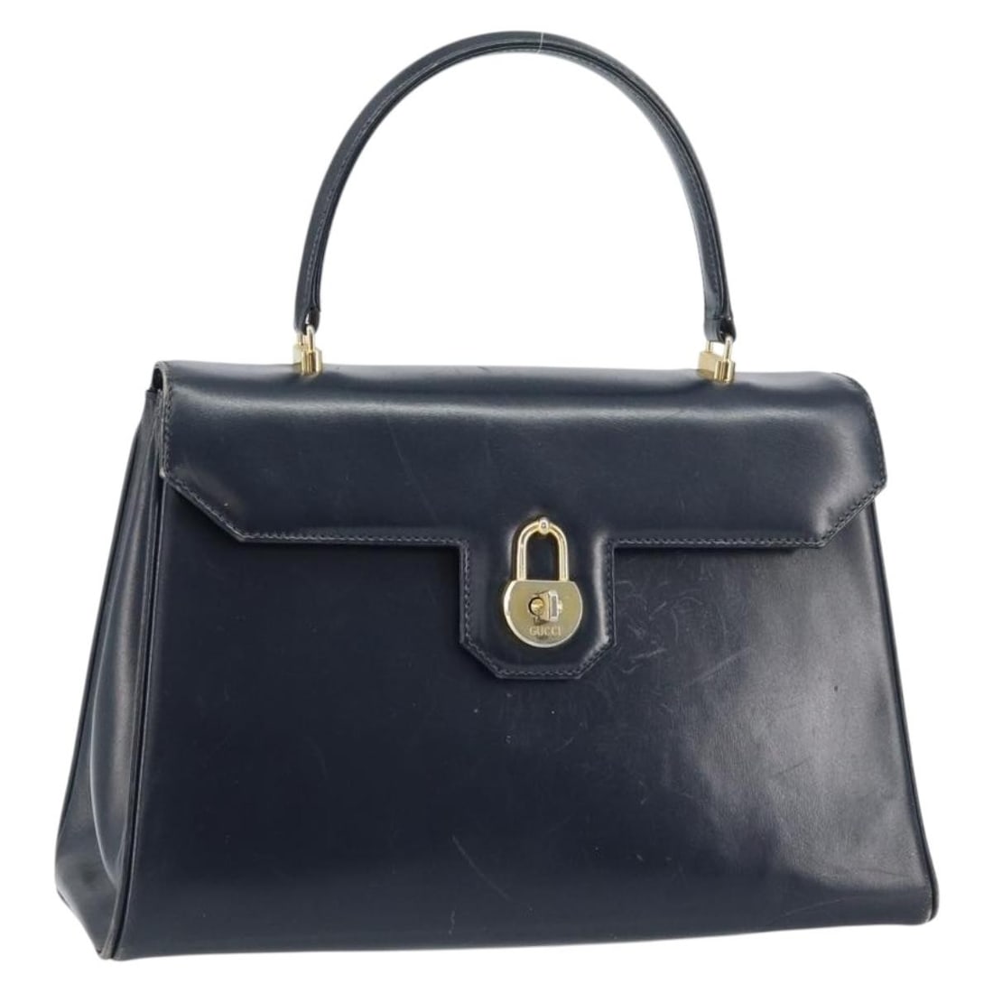Gucci Navy Leather Handbag Gold Tone Trim Made in Italy: Gucci Navy Leather Handbag Gold Tone Trim Made in Italy Gucci leather hand bag in navy and gold, made in Italy. This women's bag measures approximately 12.6 x 7.9 x 4.3 inches with a handle drop of ab